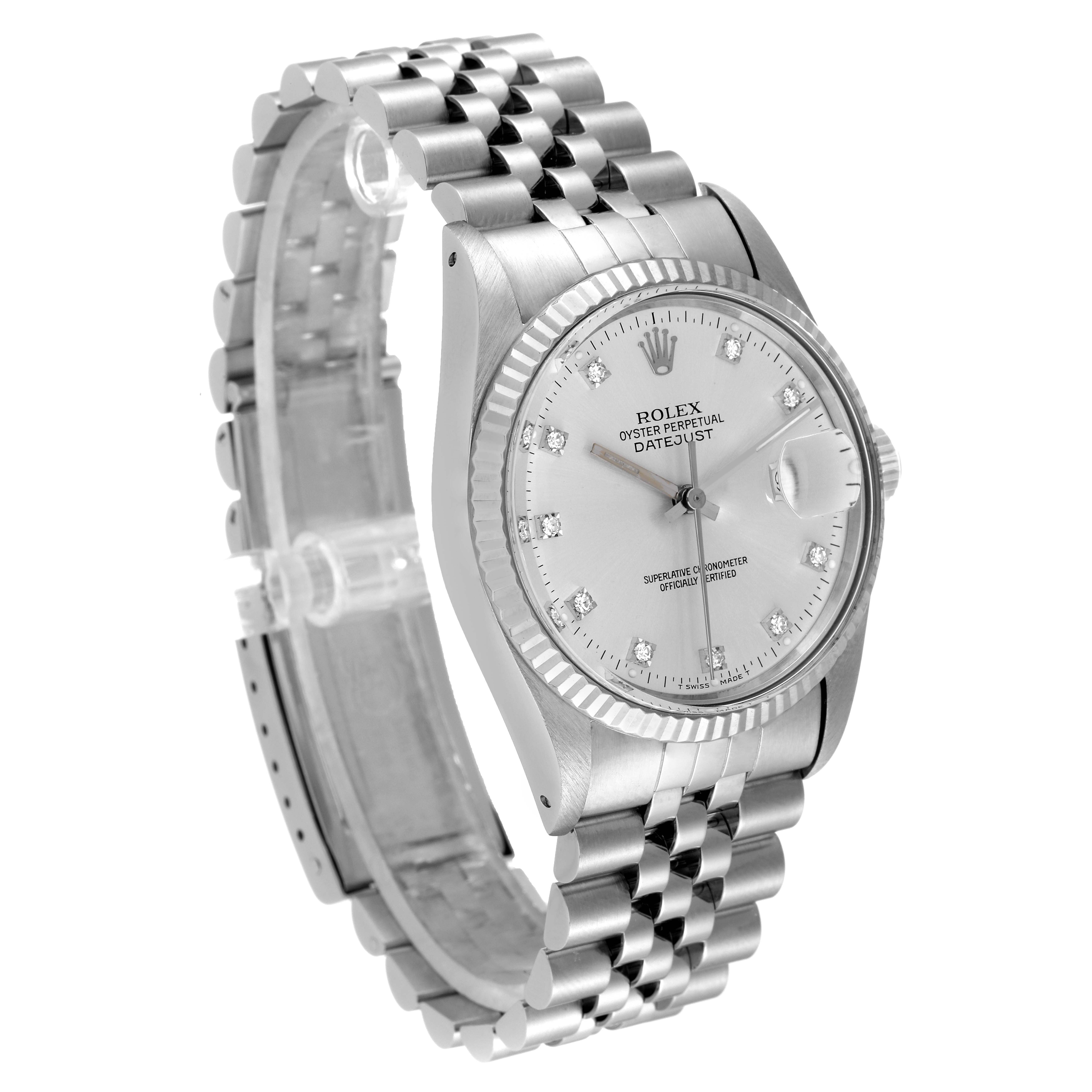 The image shows a tilted angle of the Rolex Vintage Collection 16014 Men
s Stainless Steel Silver Dial 16014 Men
s Stainless Steel Silver Dial Datejust watch, highlighting the face, bezel, and metal bracelet.