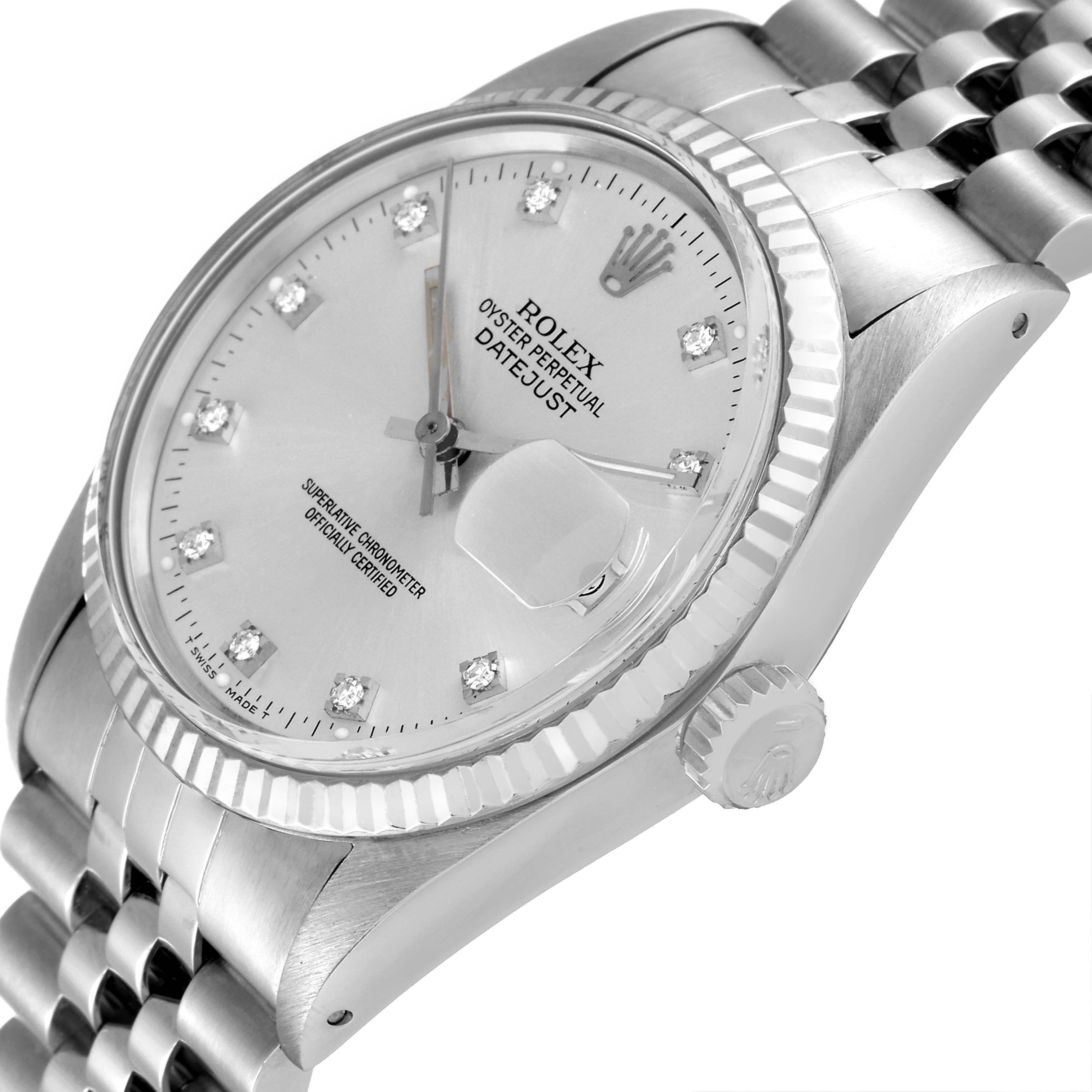 This Rolex Vintage Collection 16014 Men
s Stainless Steel Silver Dial 16014 Men
s Stainless Steel Silver Dial Datejust watch is shown at an angle highlighting the face, crown, and part of the bracelet.