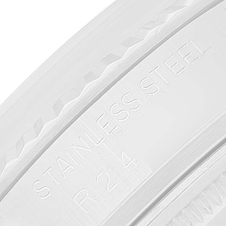 This close-up image shows the "STAINLESS STEEL" engraving on the bezel of the Rolex Vintage Collection 16014 Men
s Stainless Steel Silver Dial 16014 Men
s Stainless Steel Silver Dial watch.