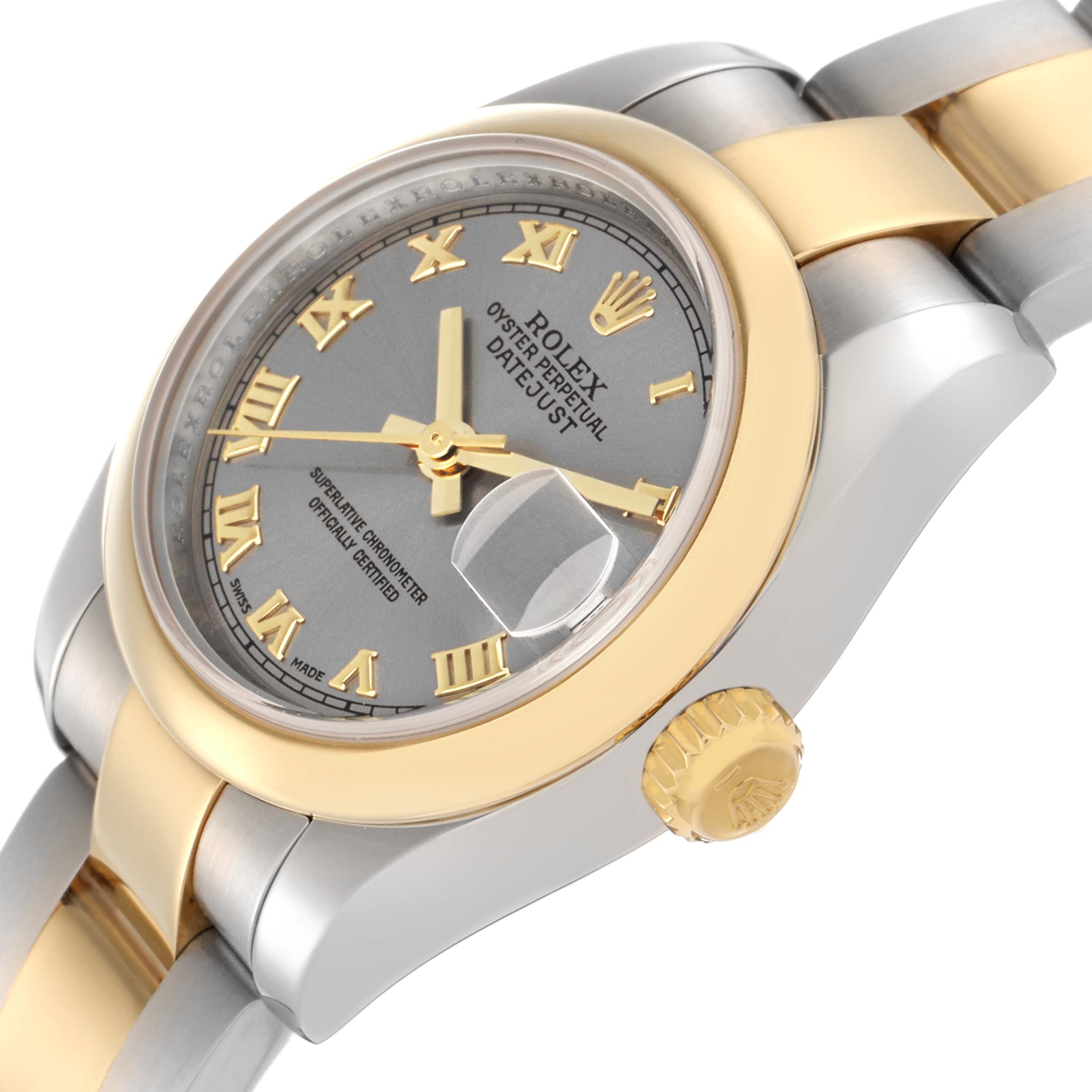 The Rolex Datejust 179163 Women
s Steel and Gold (two tone) Grey Dial 179163 Women
s Steel and Gold (two tone) Grey Dial watch is shown from a low angle, highlighting the bezel, crown, and part of the bracelet.