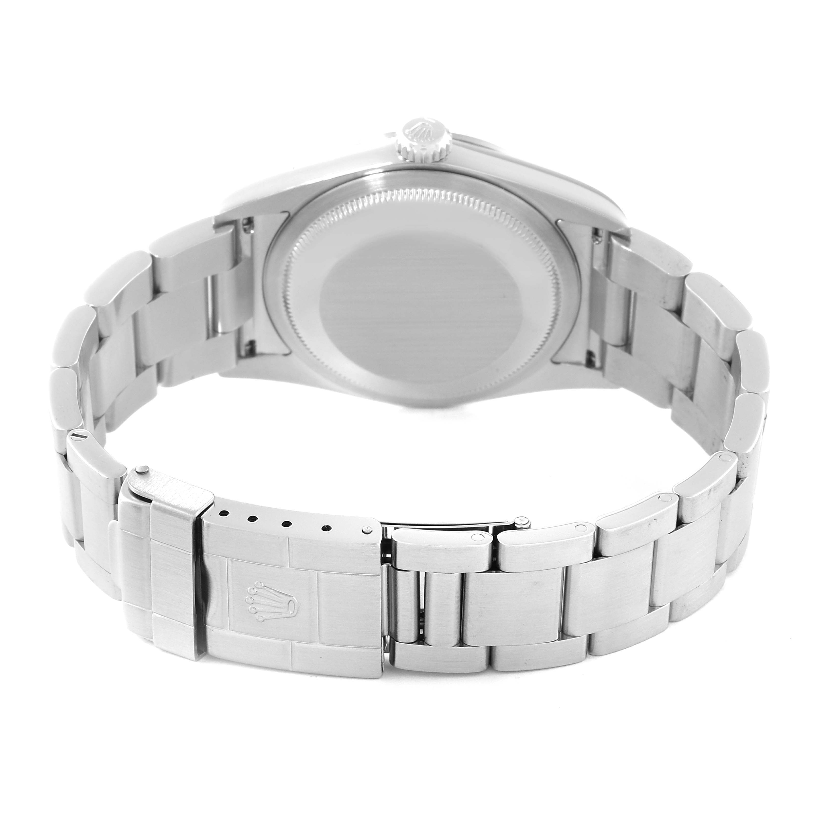 The image shows the back view of a Rolex Explorer 114270 Men
s Stainless Steel Black Dial 114270 Men
s Stainless Steel Black Dial watch, including the case back, crown, and metal bracelet with logo-engraved clasp.