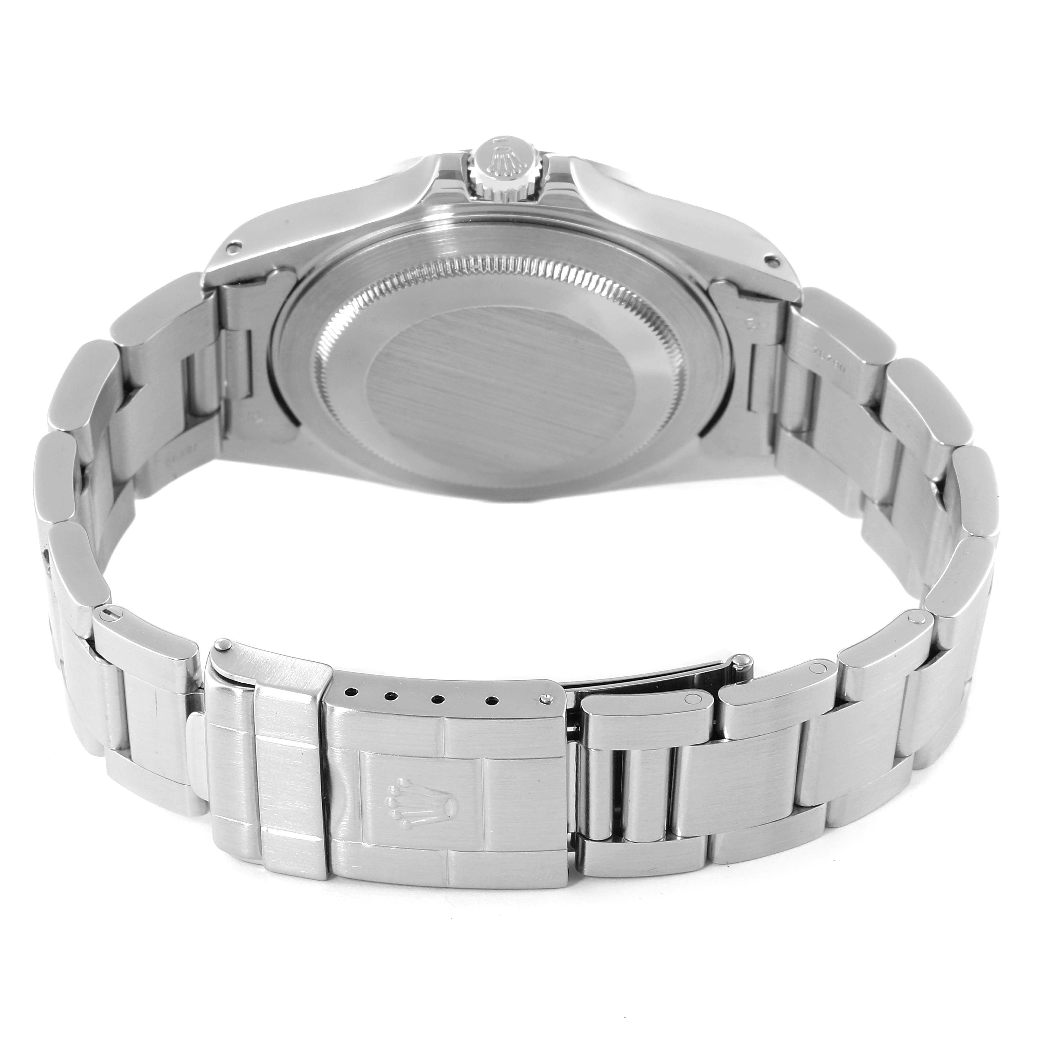 The image shows the back view of a Rolex Explorer 16570 Men's Stainless Steel Black Dial 16570 Men's Stainless Steel Black Dial watch, highlighting the case back, bracelet, and clasp.