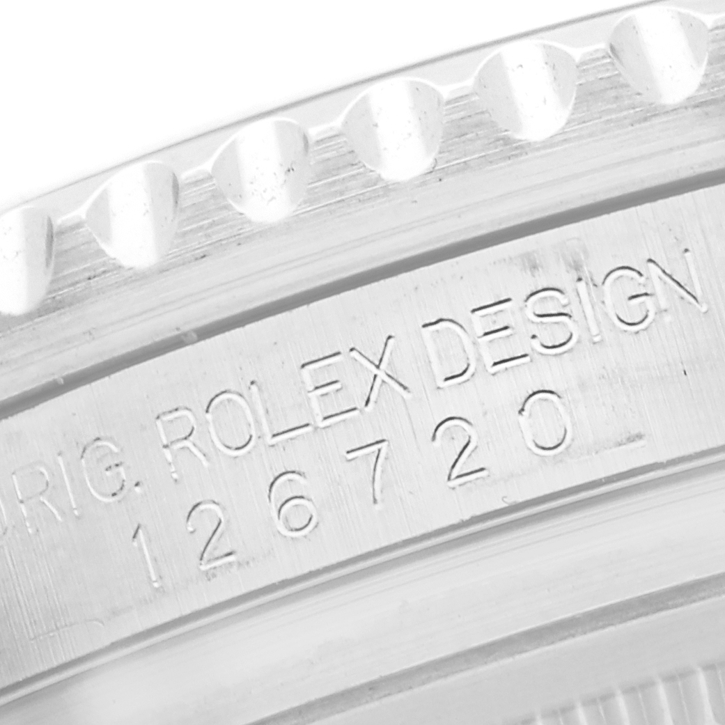 The image shows a close-up of the Rolex GMT-Master 126720VTNR Men
s Stainless Steel Black Dial 126720VTNR Men
s Stainless Steel Black Dial
s case side with engraved model number "126720".