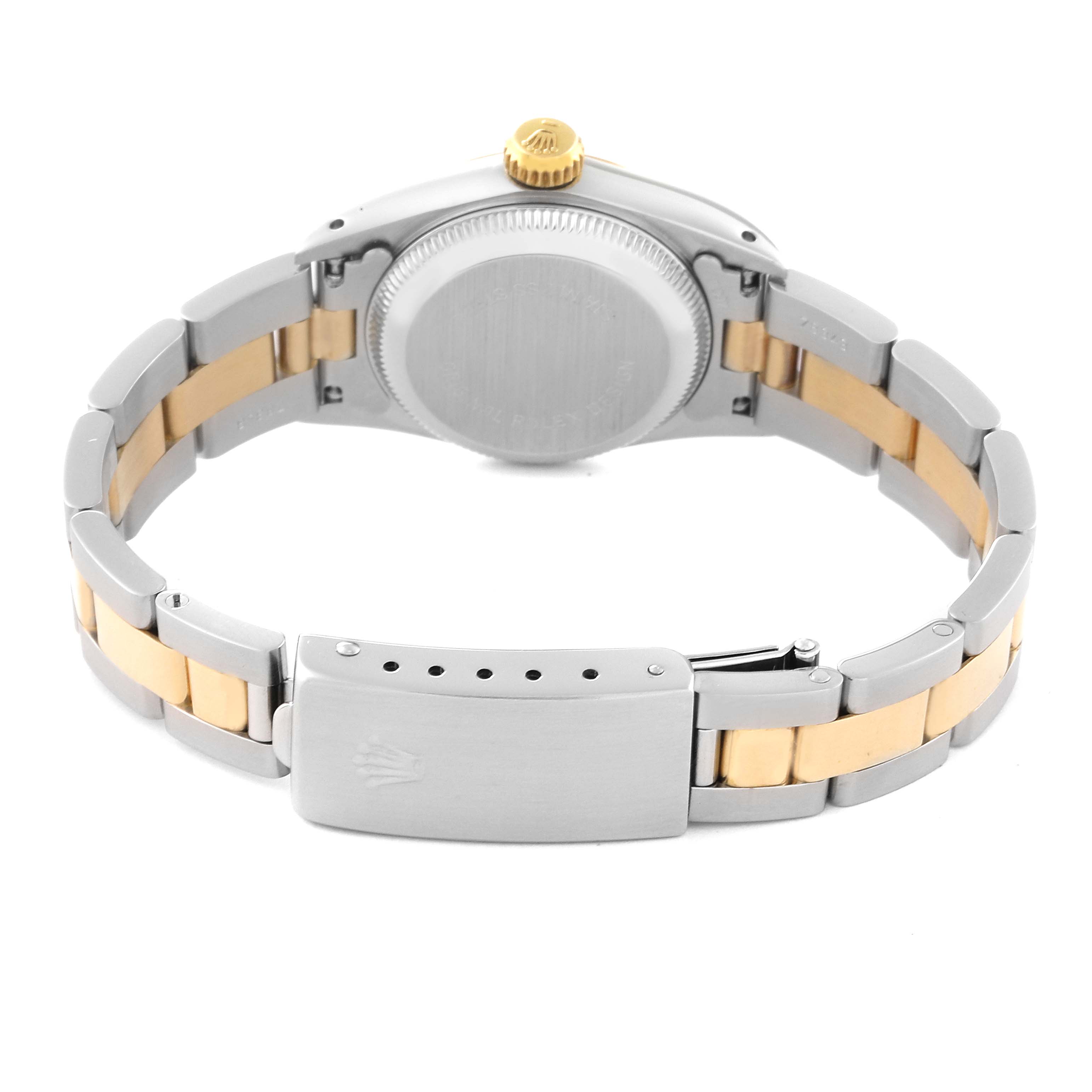 The image shows the back of a Rolex Oyster Perpetual 67243 Women
s Steel and Gold (two tone) White Dial 67243 Women
s Steel and Gold (two tone) White Dial, featuring the case, crown, bracelet, and clasp.