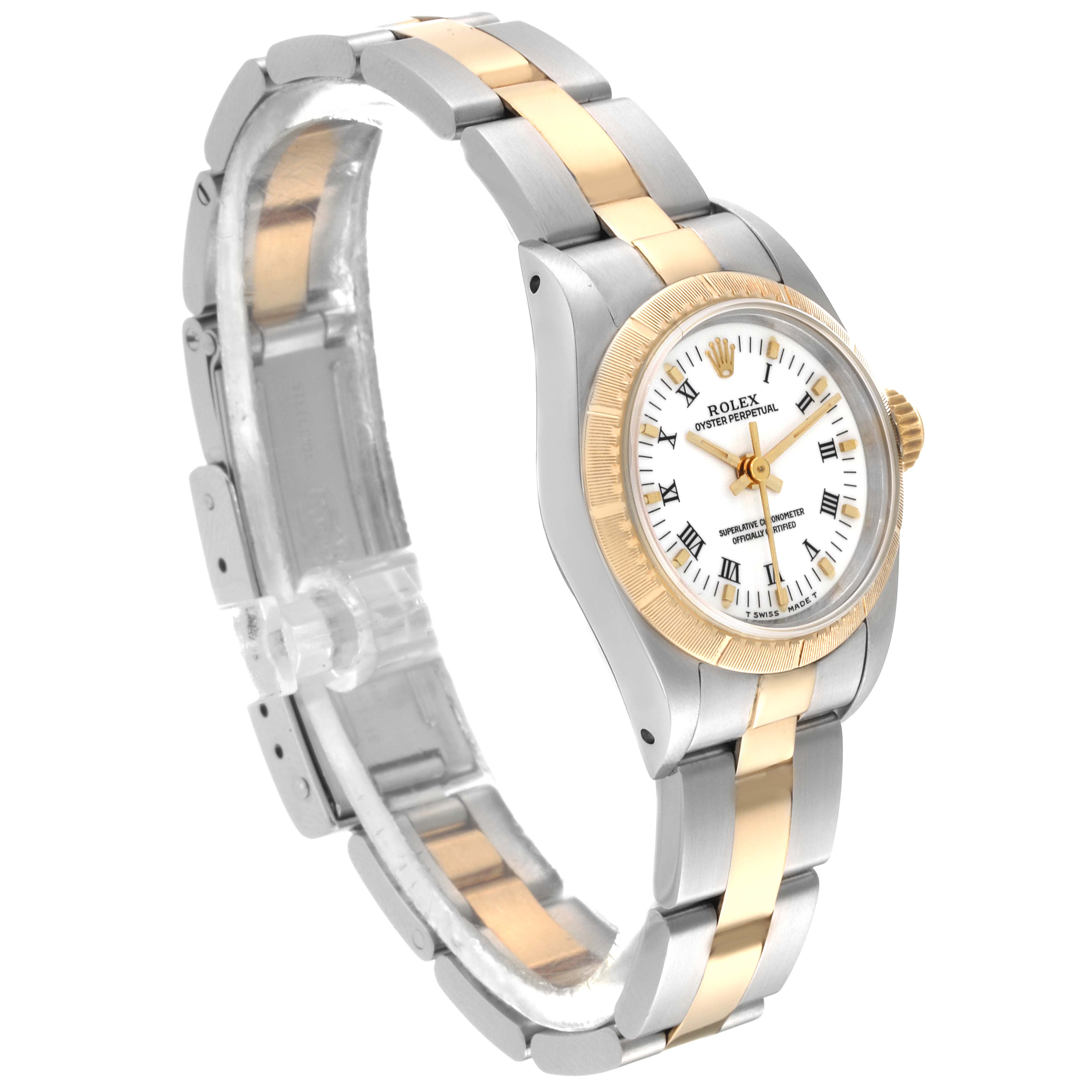 The Rolex Oyster Perpetual 67243 Women
s Steel and Gold (two tone) White Dial 67243 Women
s Steel and Gold (two tone) White Dial watch is shown at a 3/4 angle, highlighting its two-tone metal bracelet and white dial with Roman numerals.