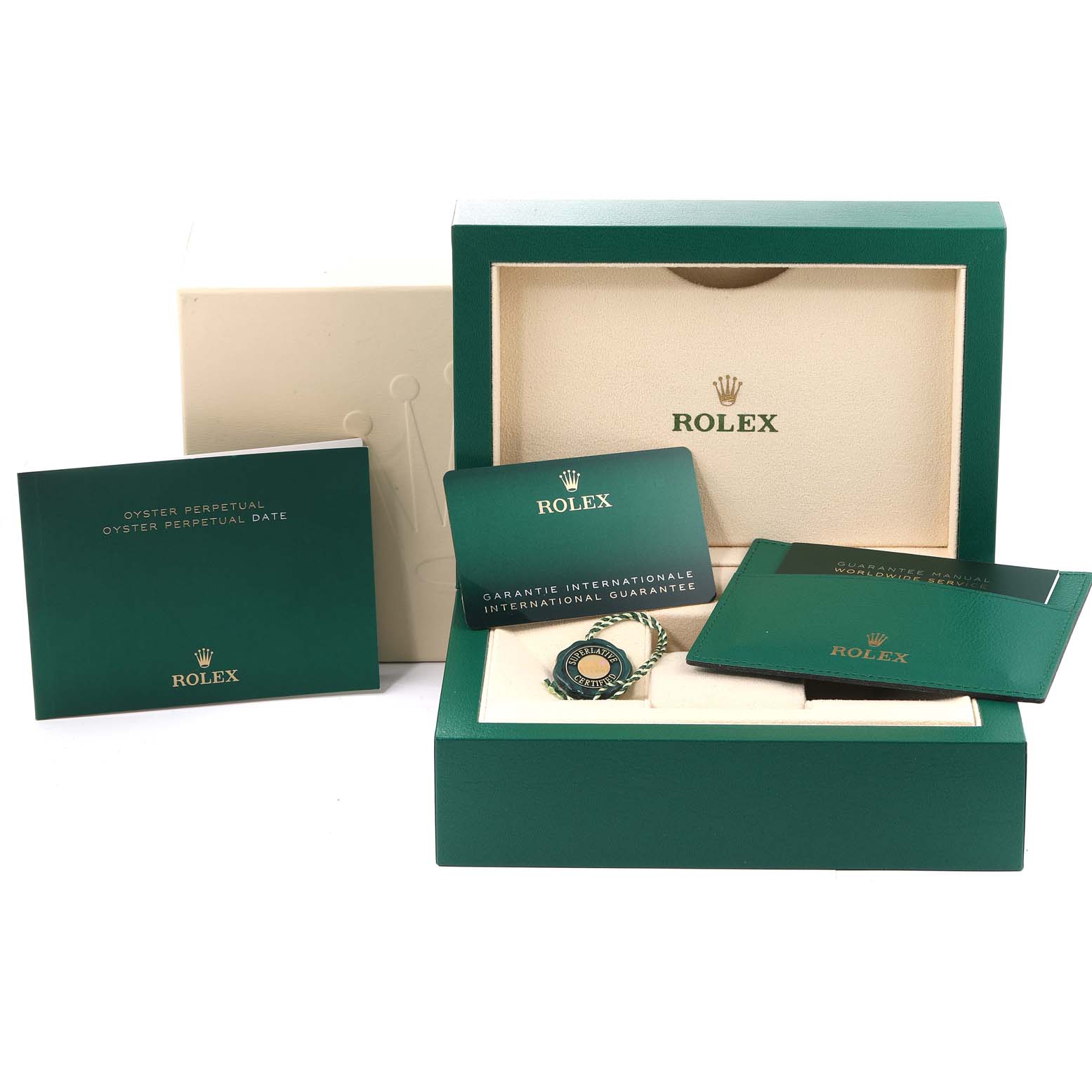 The image shows the Rolex Oyster Perpetual 276200 Women
s Stainless Steel Pink Dial 276200 Women
s Stainless Steel Pink Dial watch packaging, including the box, manuals, and international guarantee card.