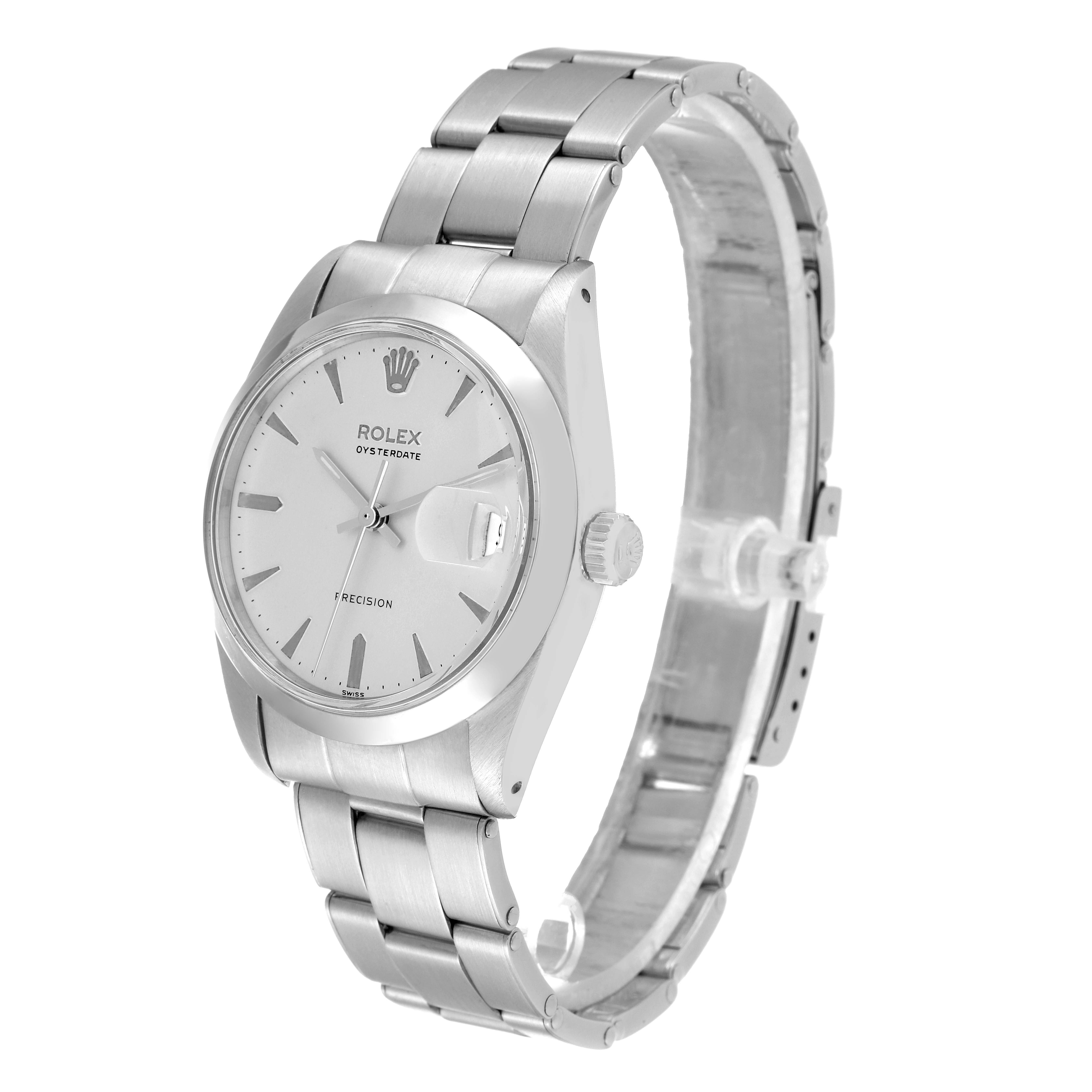 This image shows a Rolex Vintage Collection 6694 Men
s Stainless Steel Silver Dial 6694 Men
s Stainless Steel Silver Dial watch viewed from a slight angle, featuring its face, crown, and metal bracelet.