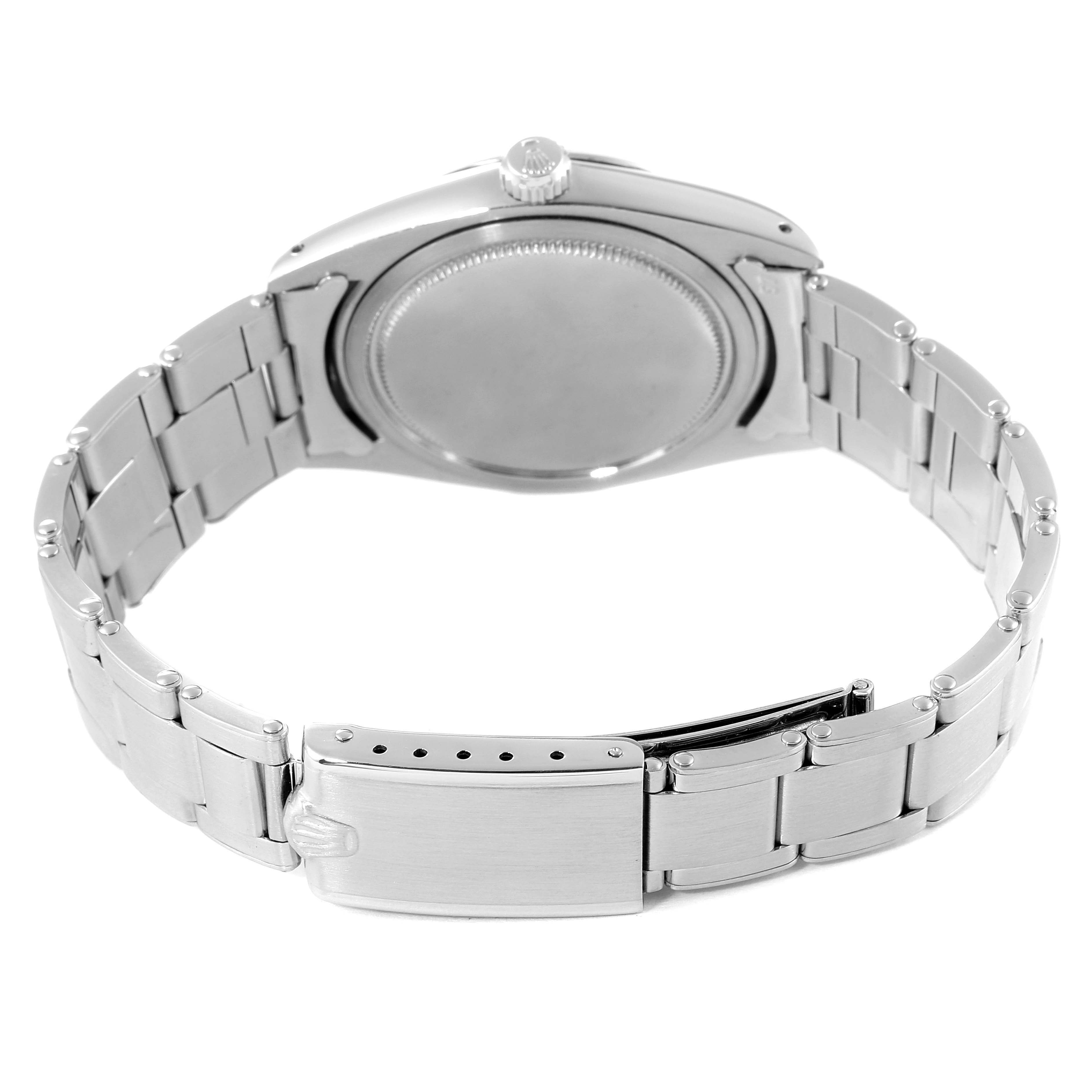 This image showcases the back and bracelet of a Vintage Collection Rolex watch from a rear angle.