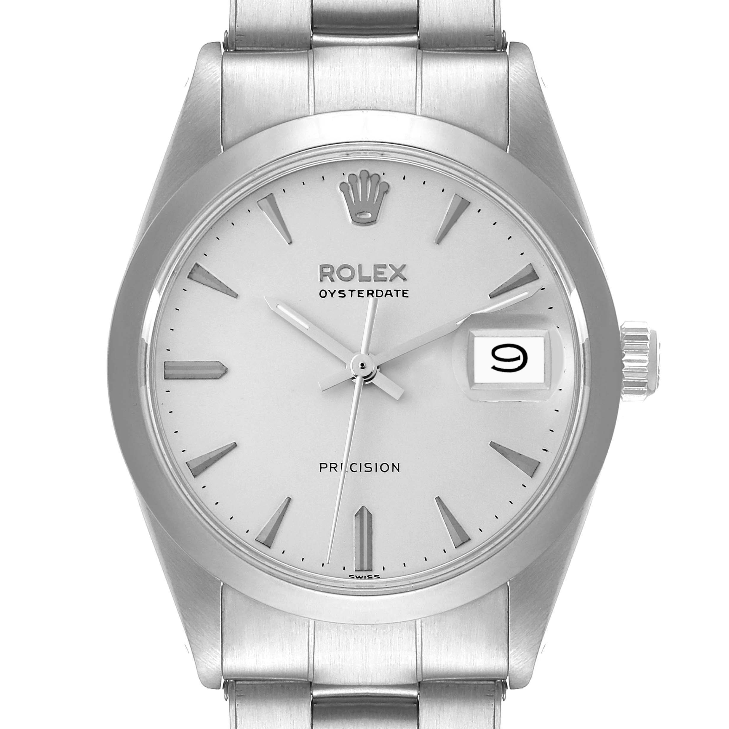 The image shows the front view of a Rolex Vintage Collection 6694 Men
s Stainless Steel Silver Dial 6694 Men
s Stainless Steel Silver Dial Oysterdate watch, featuring its dial, hands, and calendar window.