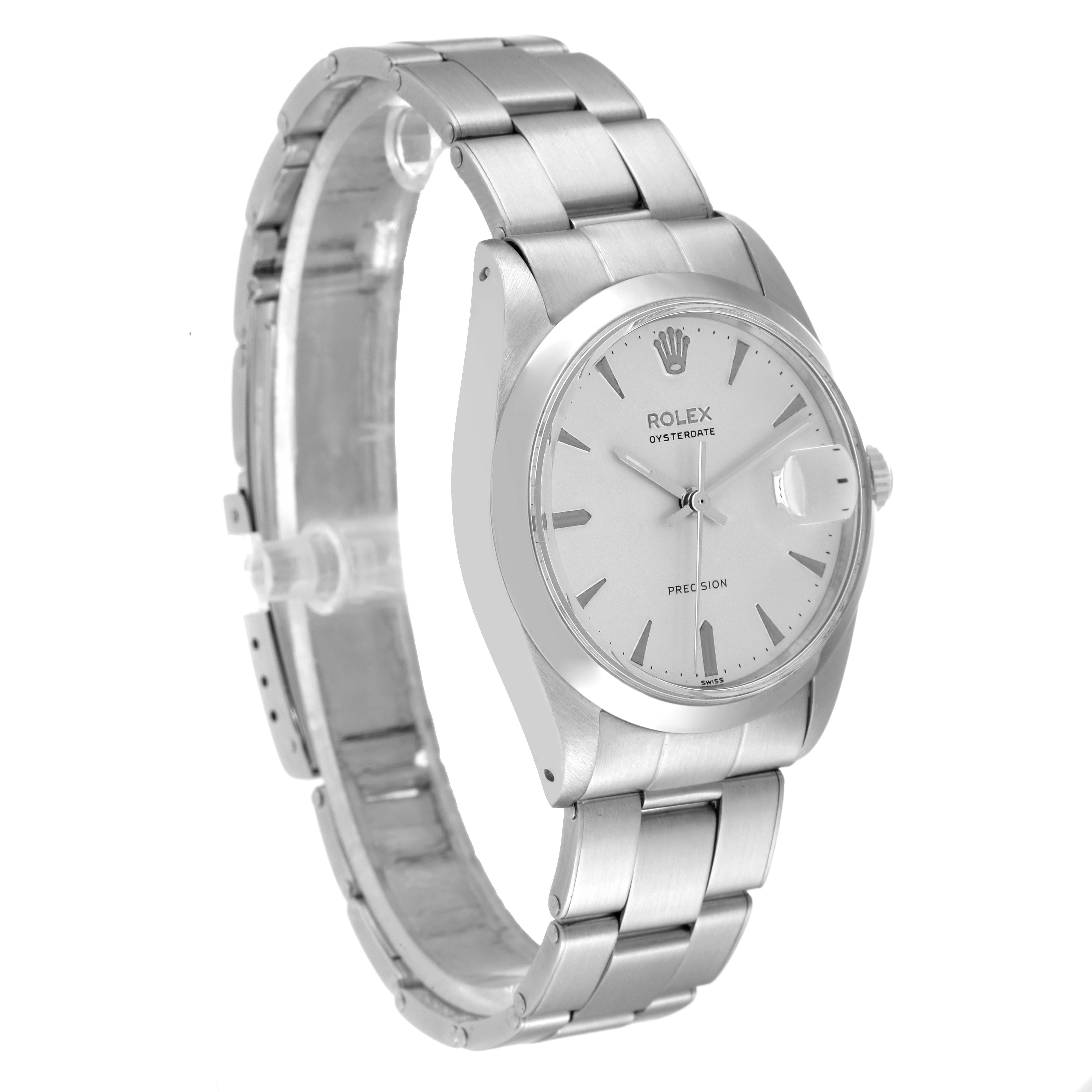 The image shows a Rolex Vintage Collection 6694 Men
s Stainless Steel Silver Dial 6694 Men
s Stainless Steel Silver Dial watch at a slight angle, displaying the face, bracelet, and clasp.