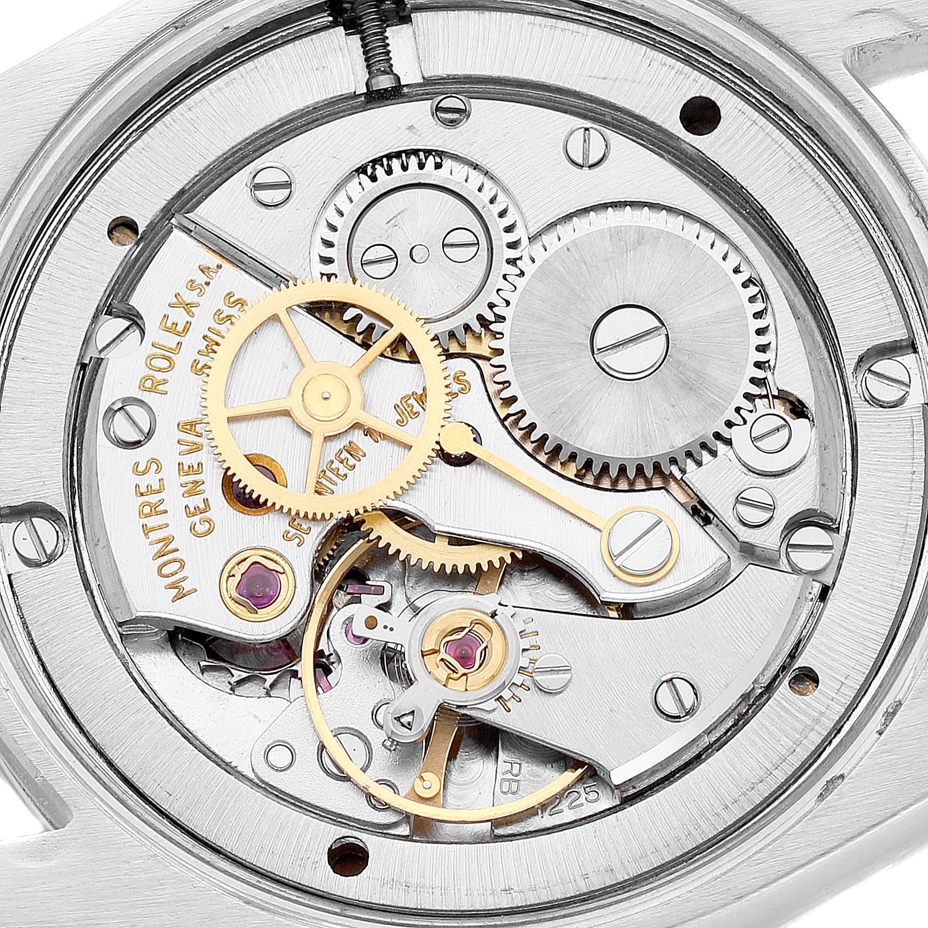 The image shows a close-up of the movement mechanism in a Rolex Vintage Collection 6694 Men
s Stainless Steel Silver Dial 6694 Men
s Stainless Steel Silver Dial model watch.