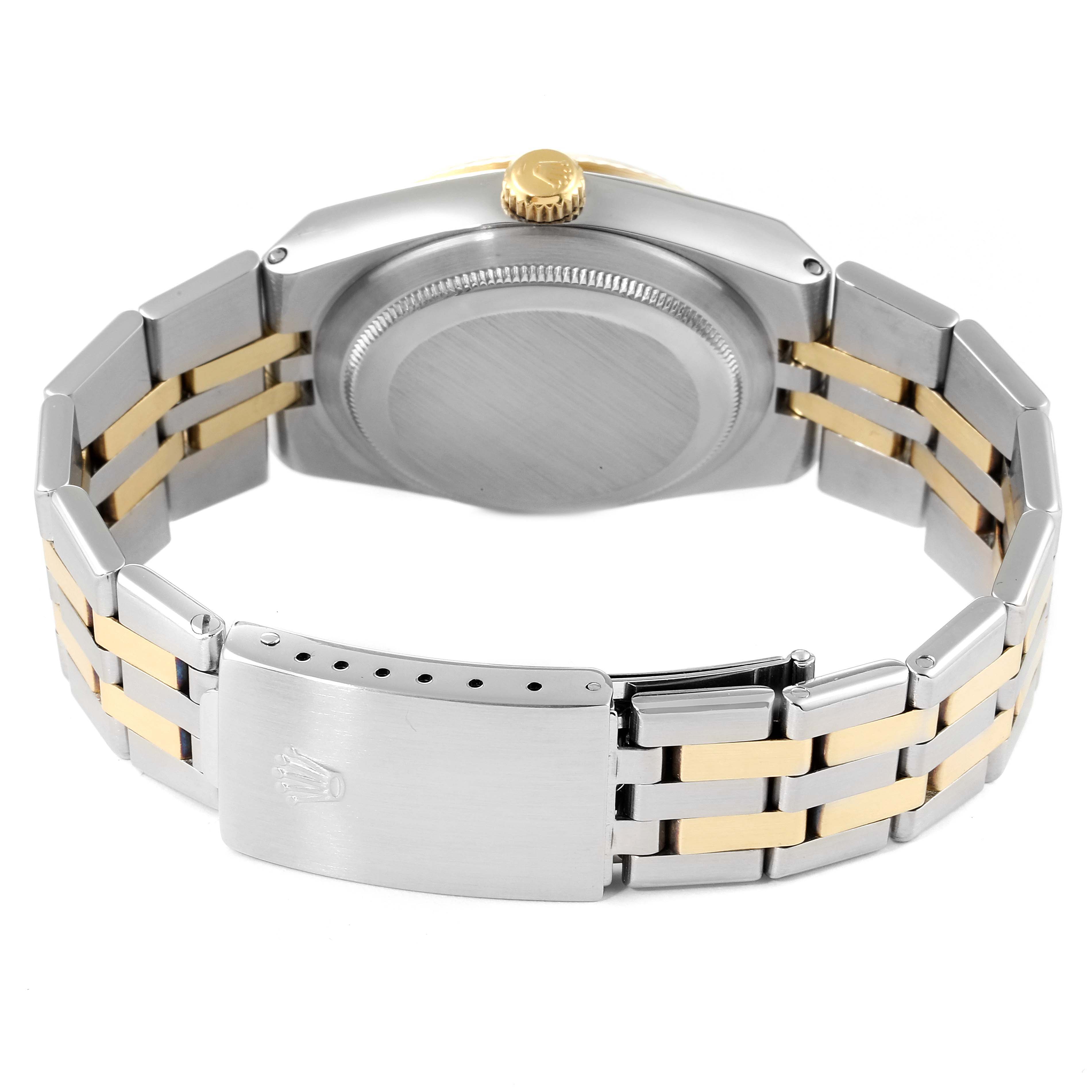 The image shows the back view of a Rolex Oysterquartz 17013 Men's Steel and Gold (two tone) Silver Dial 17013 Men's Steel and Gold (two tone) Silver Dial watch, highlighting the clasp, bracelet, and crown.
