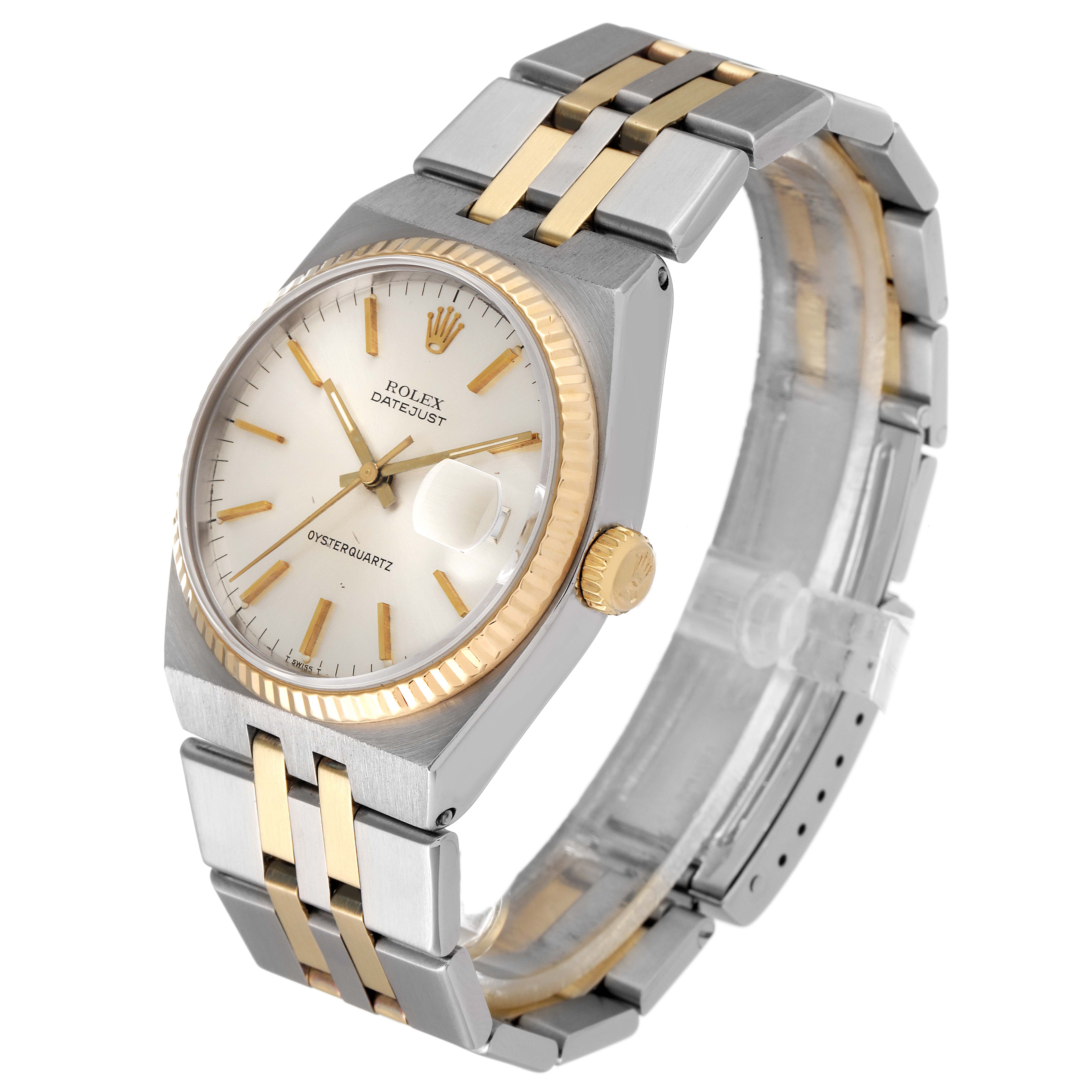 The Rolex Oysterquartz 17013 Men's Steel and Gold (two tone) Silver Dial 17013 Men's Steel and Gold (two tone) Silver Dial watch is shown at a three-quarter angle, displaying its face, bracelet, and crown.