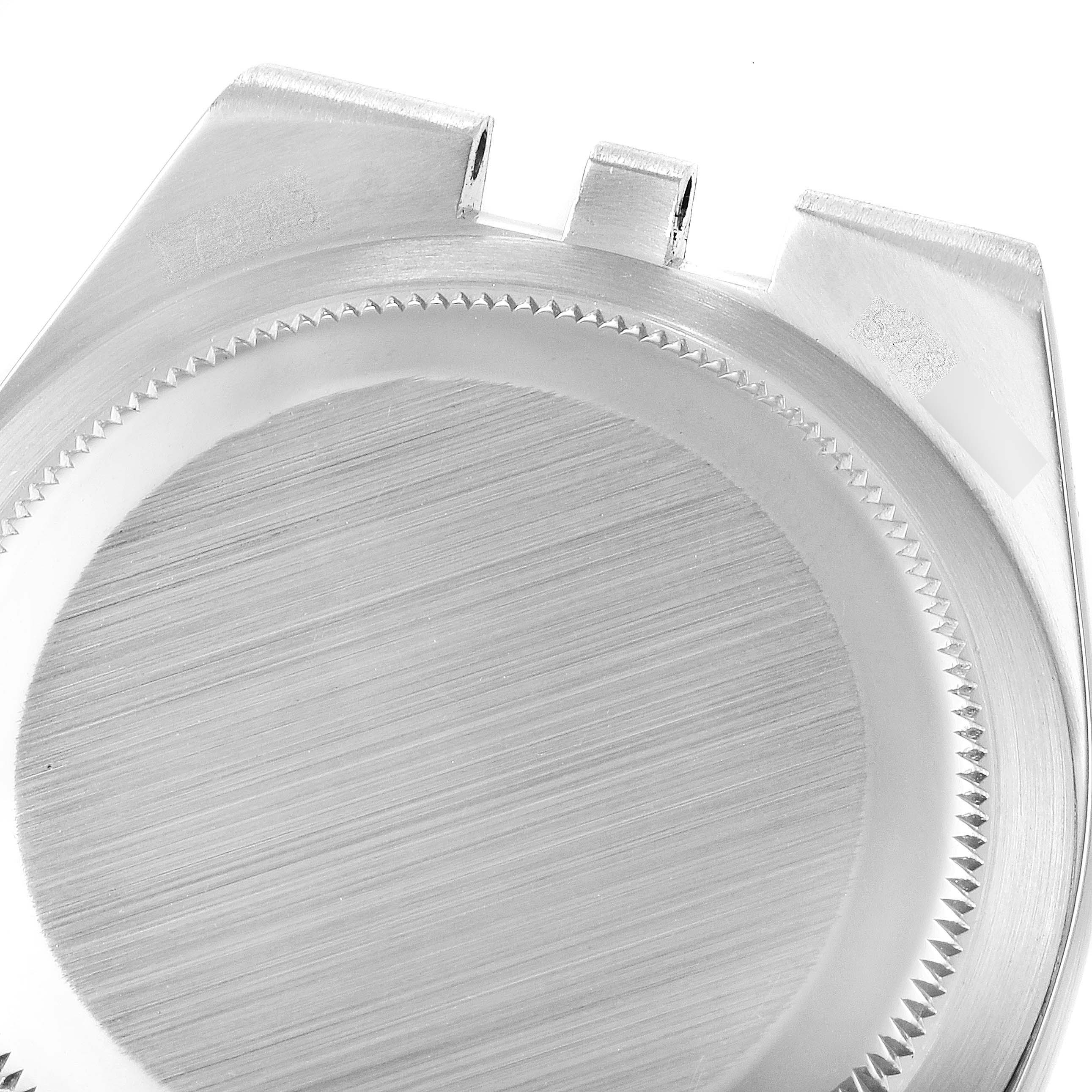 This is a close-up of the Rolex Oysterquartz 17013 Men's Steel and Gold (two tone) Silver Dial 17013 Men's Steel and Gold (two tone) Silver Dial watch case from a top-down angle, showing the bezel and lugs.