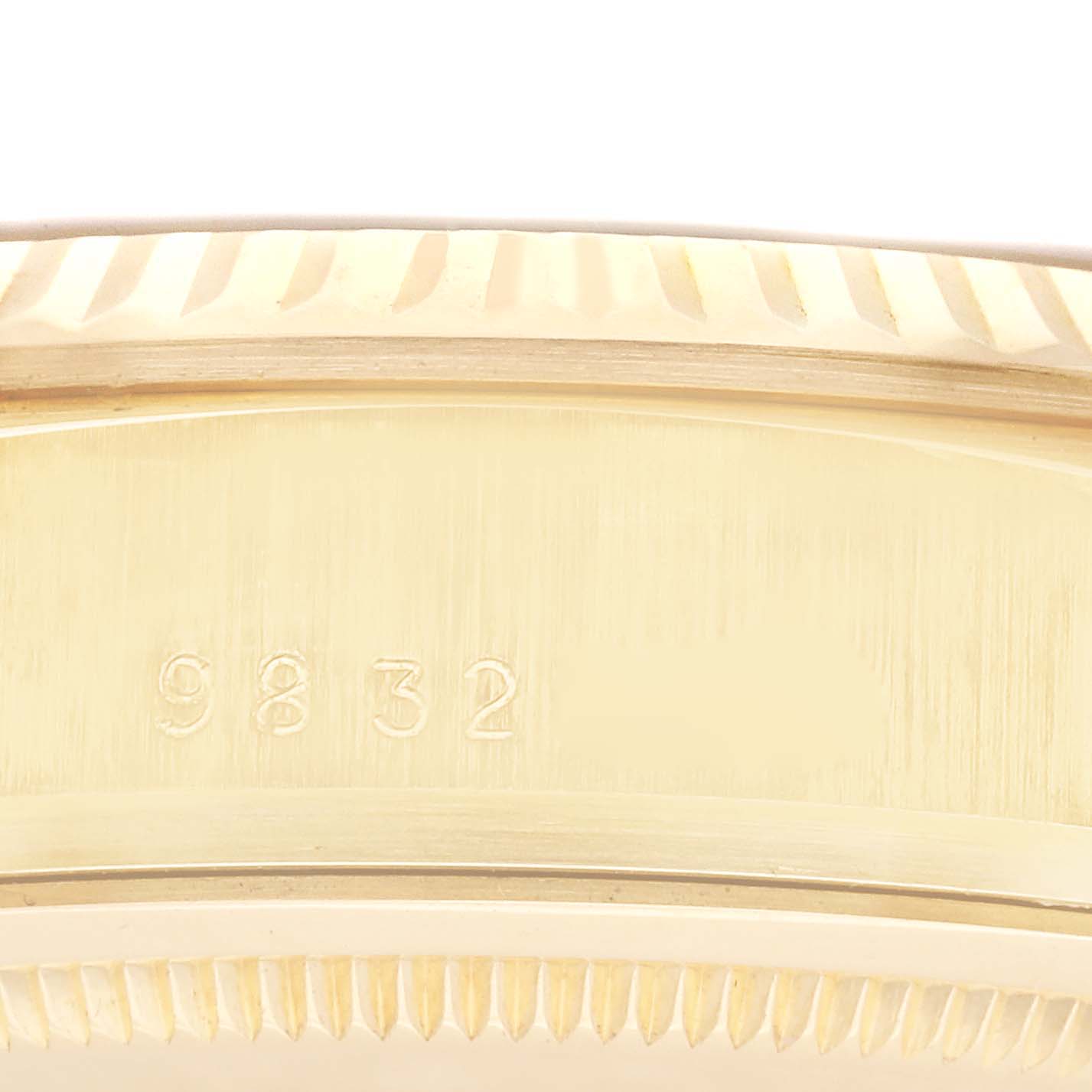 This image shows a close-up of the edge and case of a Rolex President 18038 Men
s Yellow Gold Champagne Dial 18038 Men
s Yellow Gold Champagne Dial model watch, displaying a portion of the serial number.