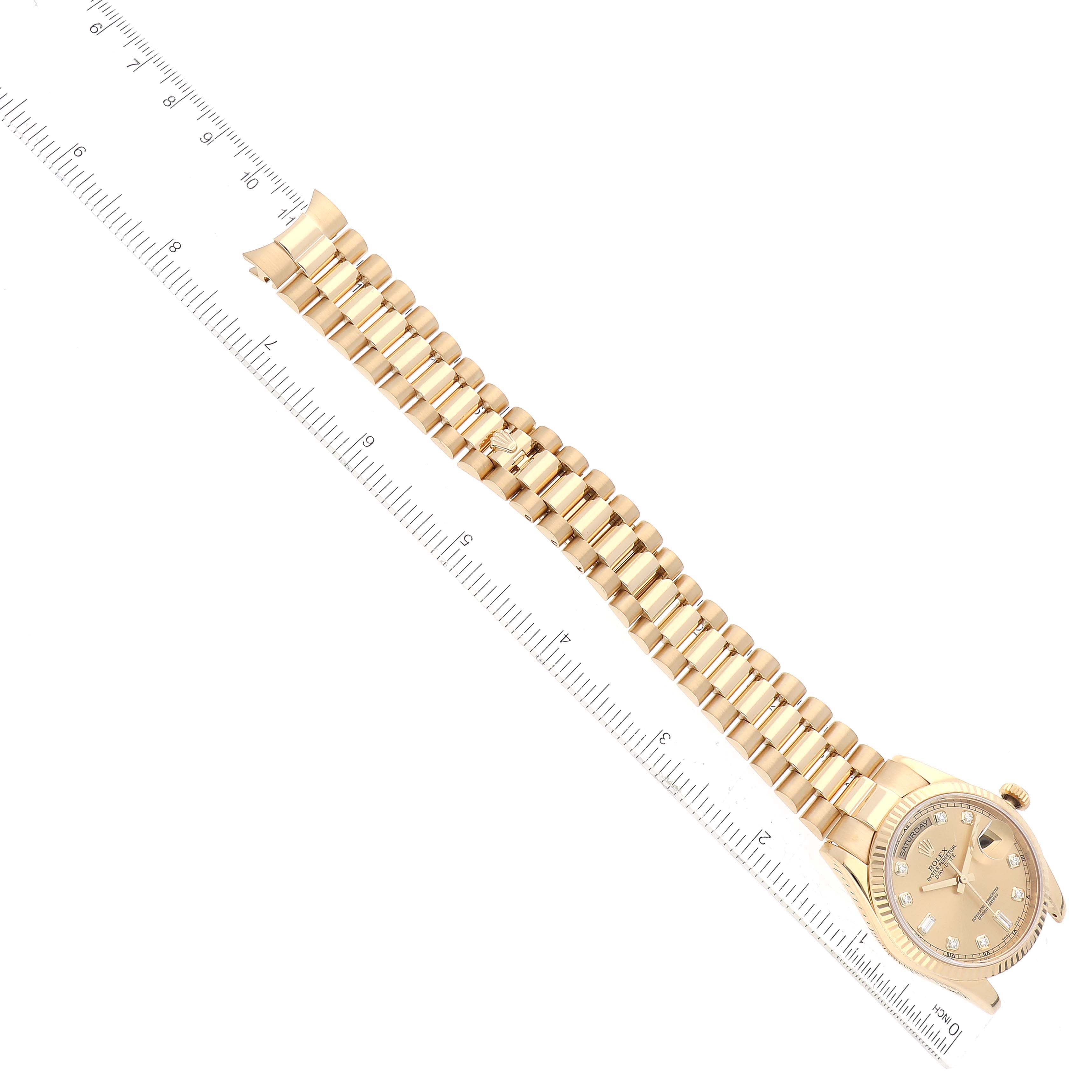 The Rolex President 118238 Men
s Yellow Gold Champagne Dial 118238 Men
s Yellow Gold Champagne Dial model watch is shown from an overhead angle, displaying the bracelet and face next to a ruler for scale.