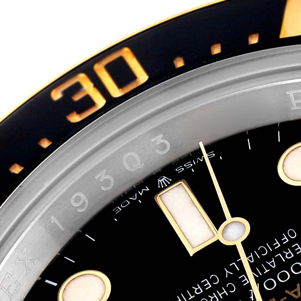 The image shows a close-up of the bezel, dial, and hands of the Rolex Sea-Dweller 126603 Men's Steel and Gold (two tone) Black Dial 126603 Men's Steel and Gold (two tone) Black Dial watch.
