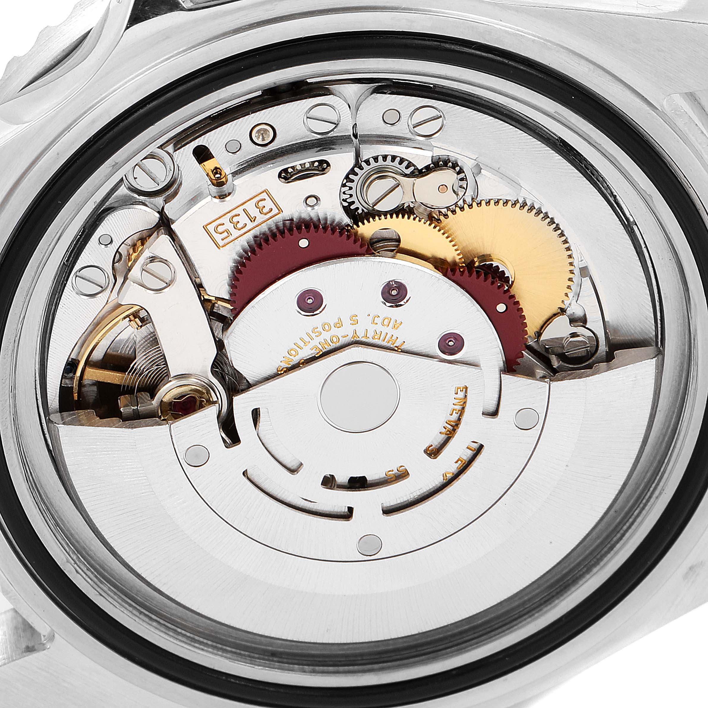 This image shows the internal mechanical movement of a Rolex Submariner 16610 Men
s Stainless Steel Black Dial 16610 Men
s Stainless Steel Black Dial watch viewed from the back.