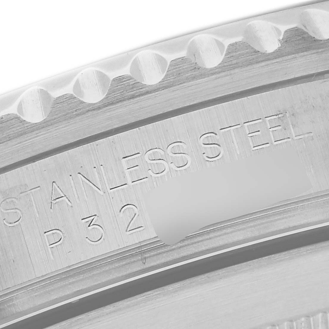 The image shows a close-up angle of the stainless steel bezel and engravings on a Rolex Submariner 16610 Men
s Stainless Steel Black Dial 16610 Men
s Stainless Steel Black Dial watch.