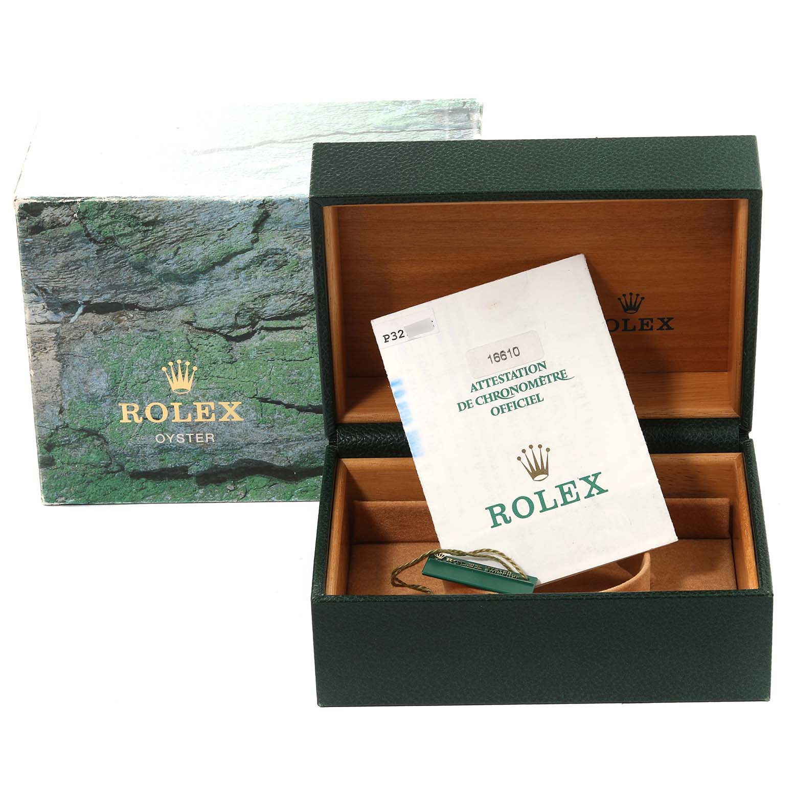 The image shows the open box and paperwork for a Rolex Submariner 16610 Men
s Stainless Steel Black Dial 16610 Men
s Stainless Steel Black Dial, including an outer box, inner box, and official documentation.