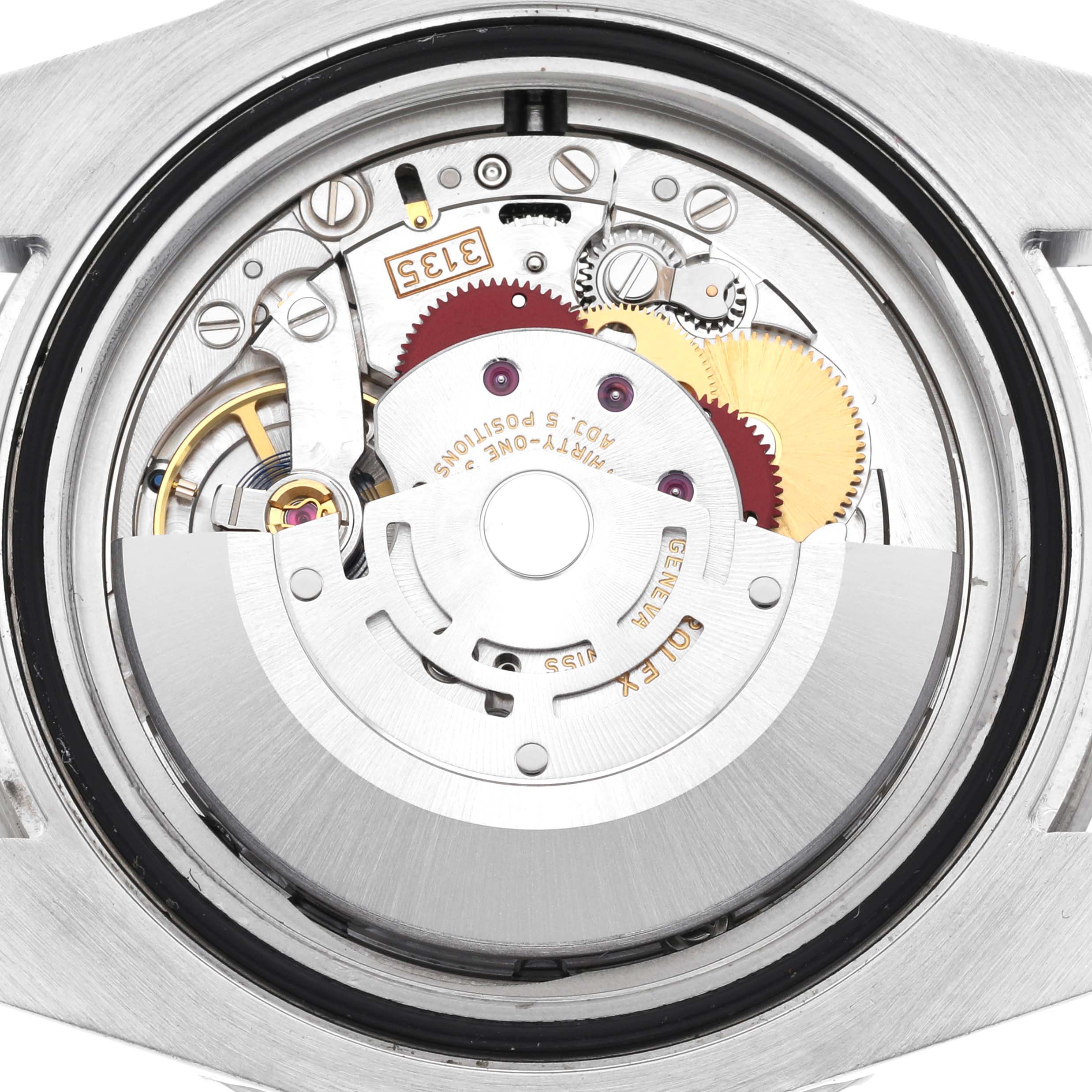 The image shows the open back of a Rolex Submariner 116610LV Men's Stainless Steel Green Dial 116610LV Men's Stainless Steel Green Dial, revealing the intricate movement components.