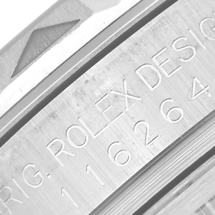The image shows a close-up of the bezel and engraved serial number on a Rolex Turn-o-Graph 116264 Men
s Stainless Steel White Dial 116264 Men
s Stainless Steel White Dial watch.