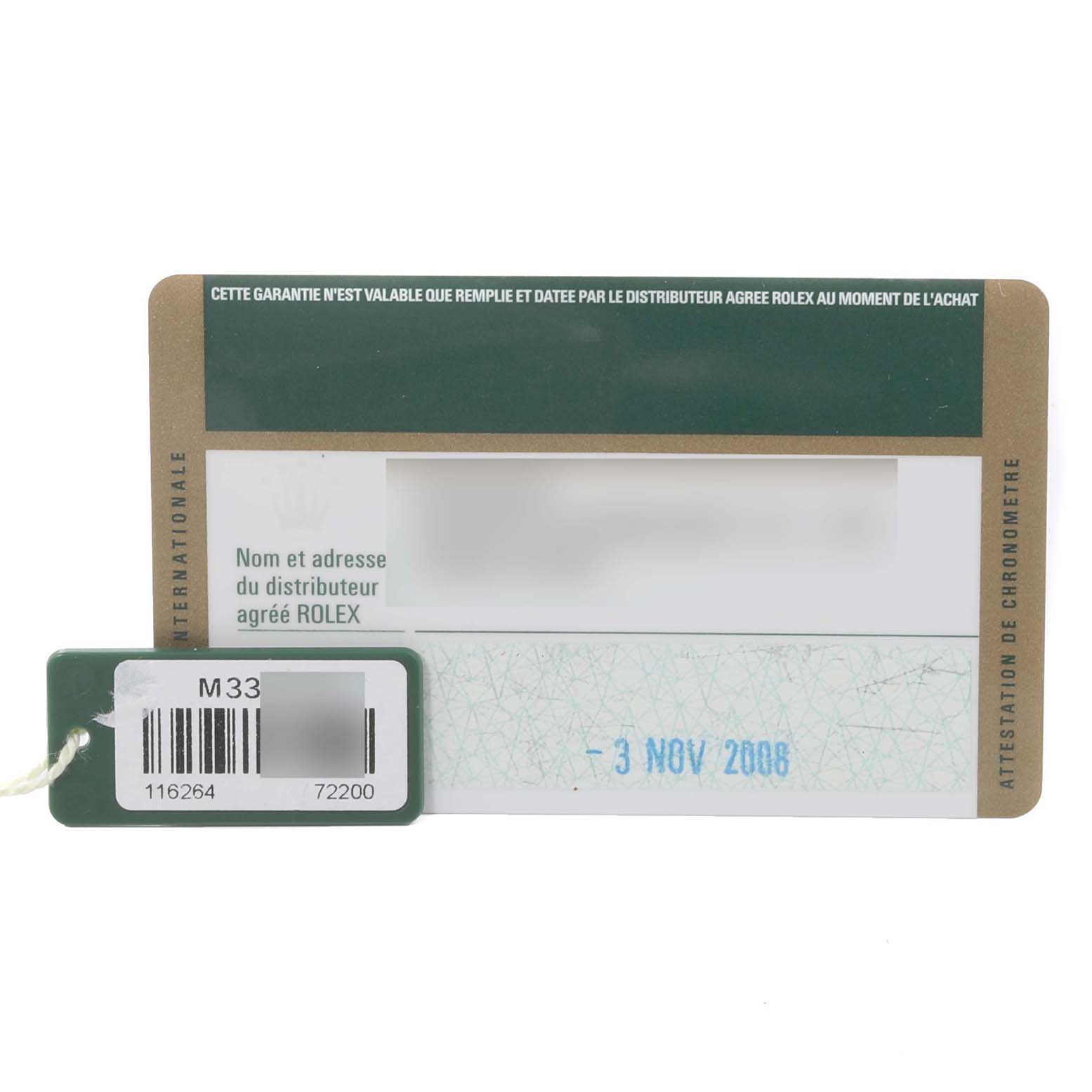 The image shows the warranty card and a hang tag for the Rolex Turn-o-Graph 116264 Men
s Stainless Steel White Dial 116264 Men
s Stainless Steel White Dial model.