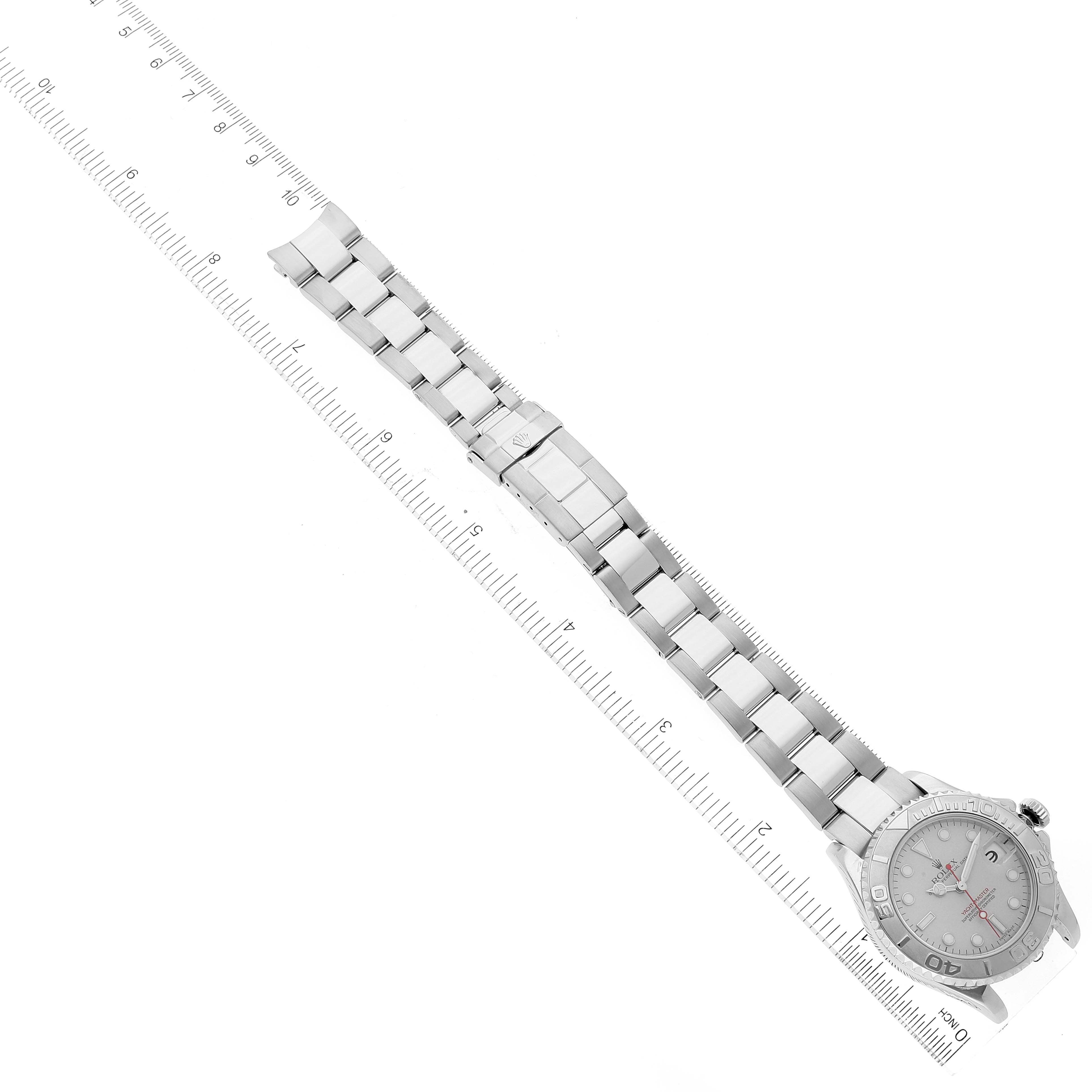 The image shows a top-down view of a Rolex Yacht-Master 168622 Men's Platinum Silver Dial 168622 Men's Platinum Silver Dial watch, including the case, dial, and full bracelet with a measuring scale.
