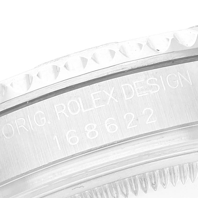 The image shows a close-up of the side of a Rolex Yacht-Master 168622 Men's Platinum Silver Dial 168622 Men's Platinum Silver Dial watch case with the model number 168622 engraved.