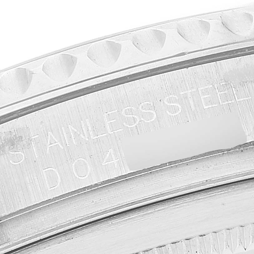This close-up image shows the stainless steel bezel and part of the caseback engraving of a Rolex Yacht-Master 16622 Men
s Stainless Steel Silver Dial 16622 Men
s Stainless Steel Silver Dial watch.