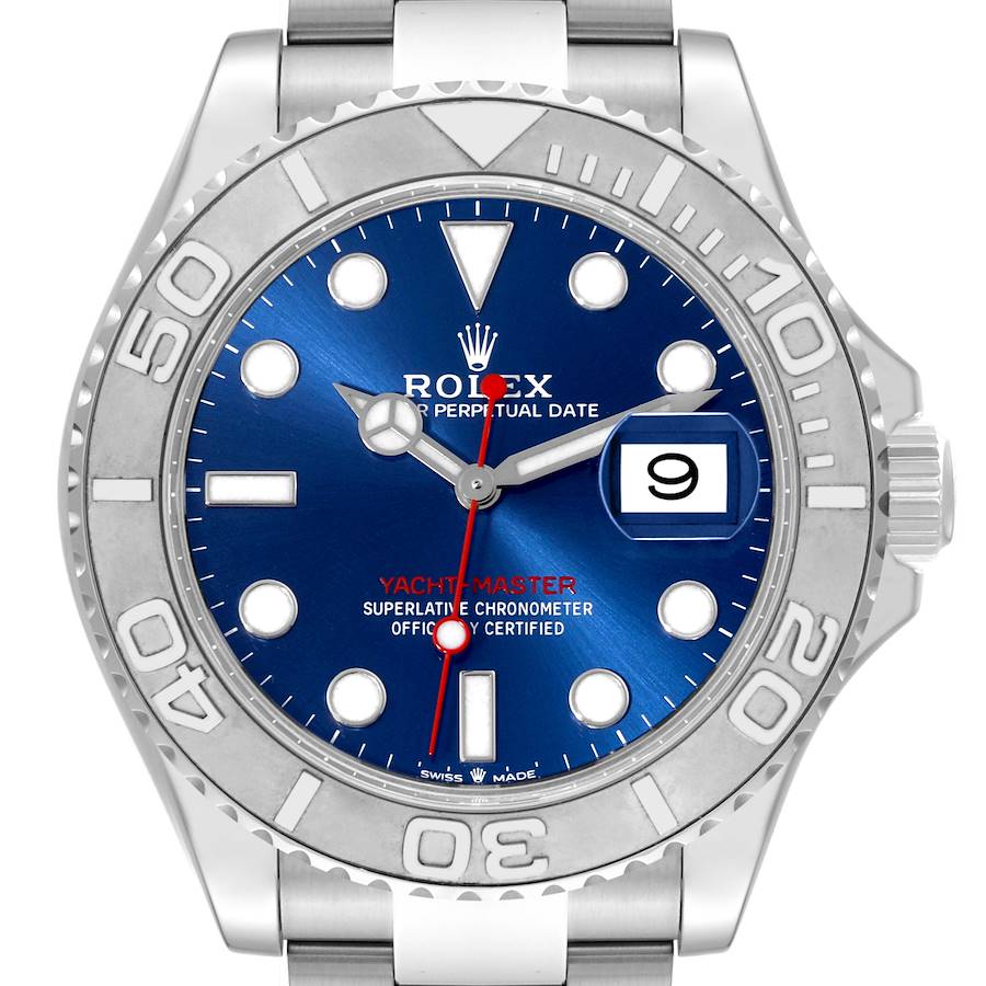 The Rolex Yacht-Master watch is shown from a front angle, featuring a blue dial, date window, and stainless steel case.