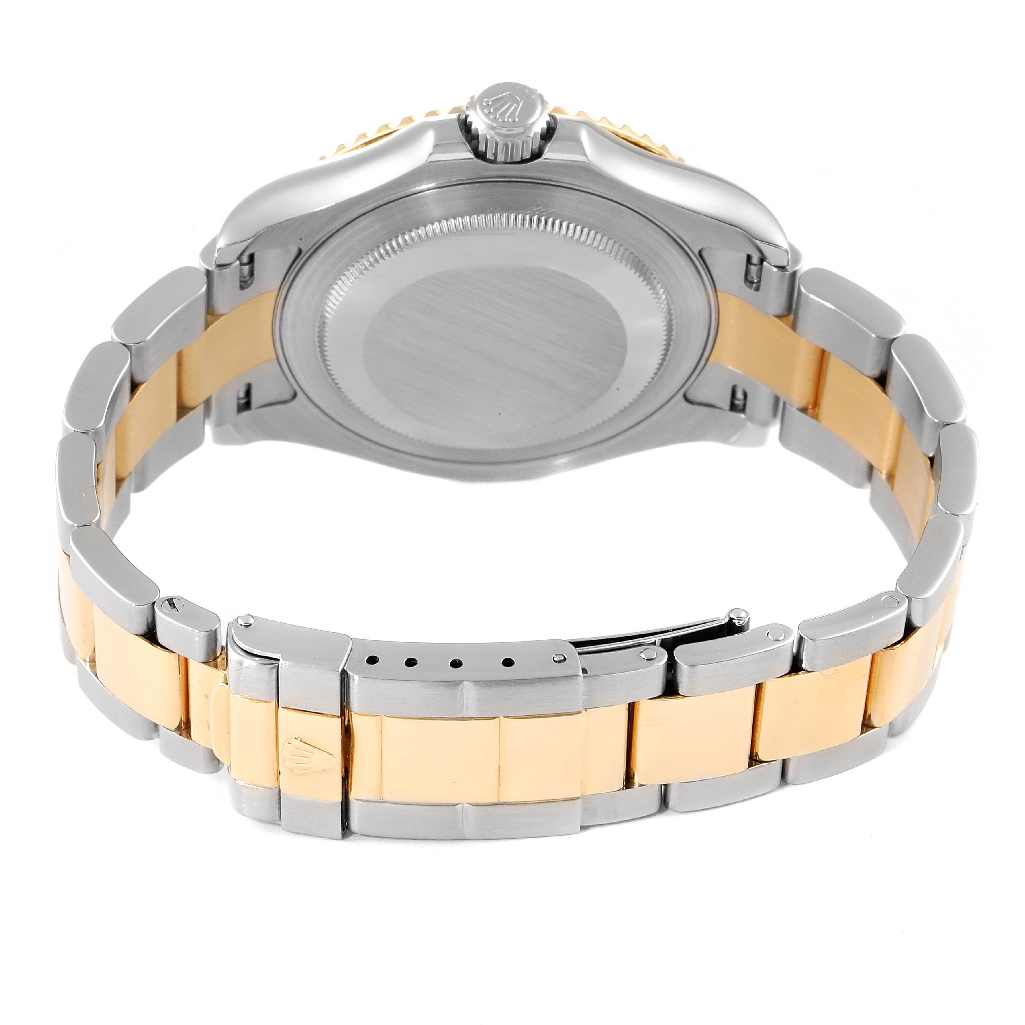 The image shows the back and bracelet of a Rolex Yacht-Master 16623 Men
s Steel and Gold (two tone) Grey Dial 16623 Men
s Steel and Gold (two tone) Grey Dial watch, highlighting its two-tone metal design.