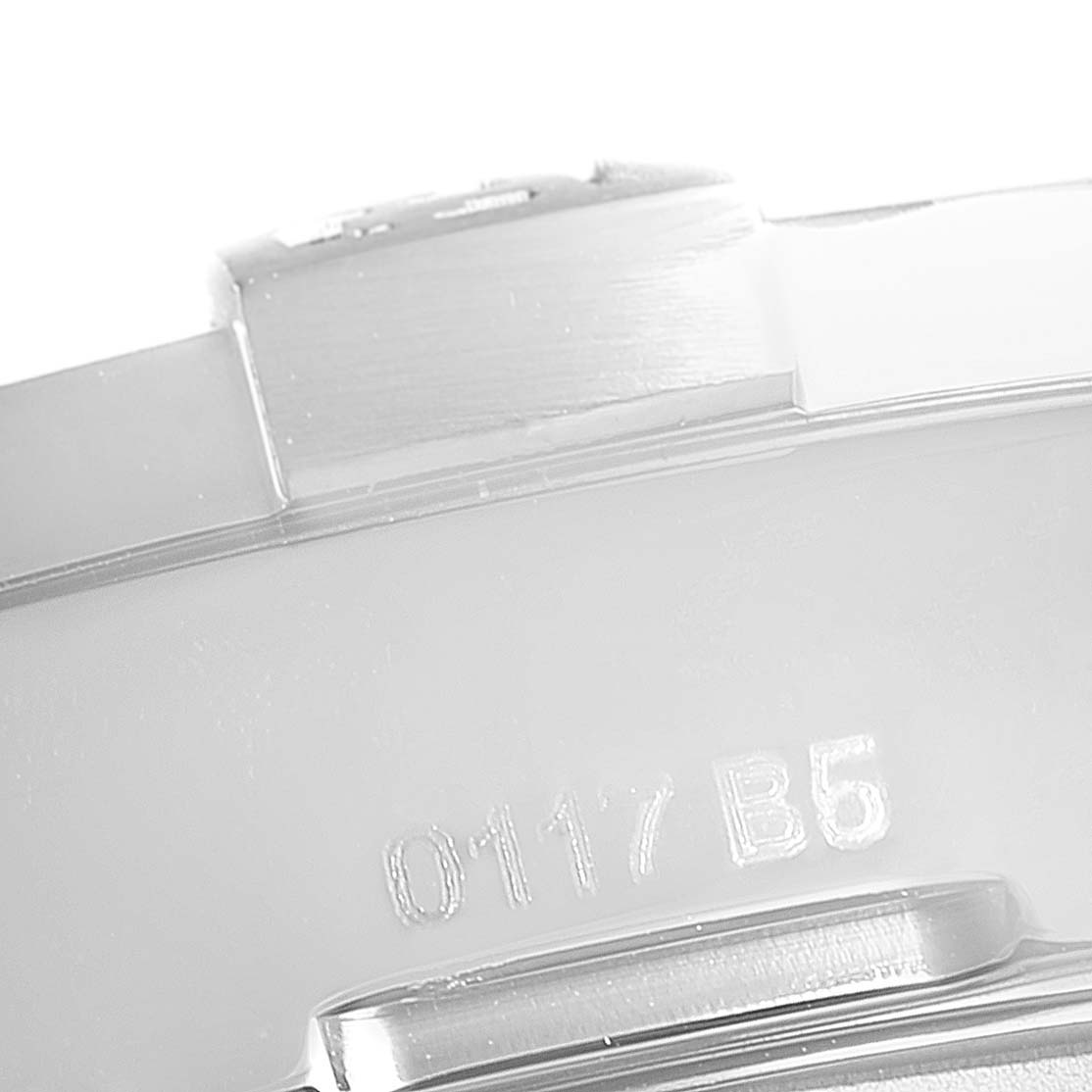 This image shows a close-up of part of the bezel and engraving on the casing of a Breitling Avenger A3239011-C872-170A  Men's Stainless Steel Black Dial A3239011-C872-170A  Men's Stainless Steel Black Dial watch.