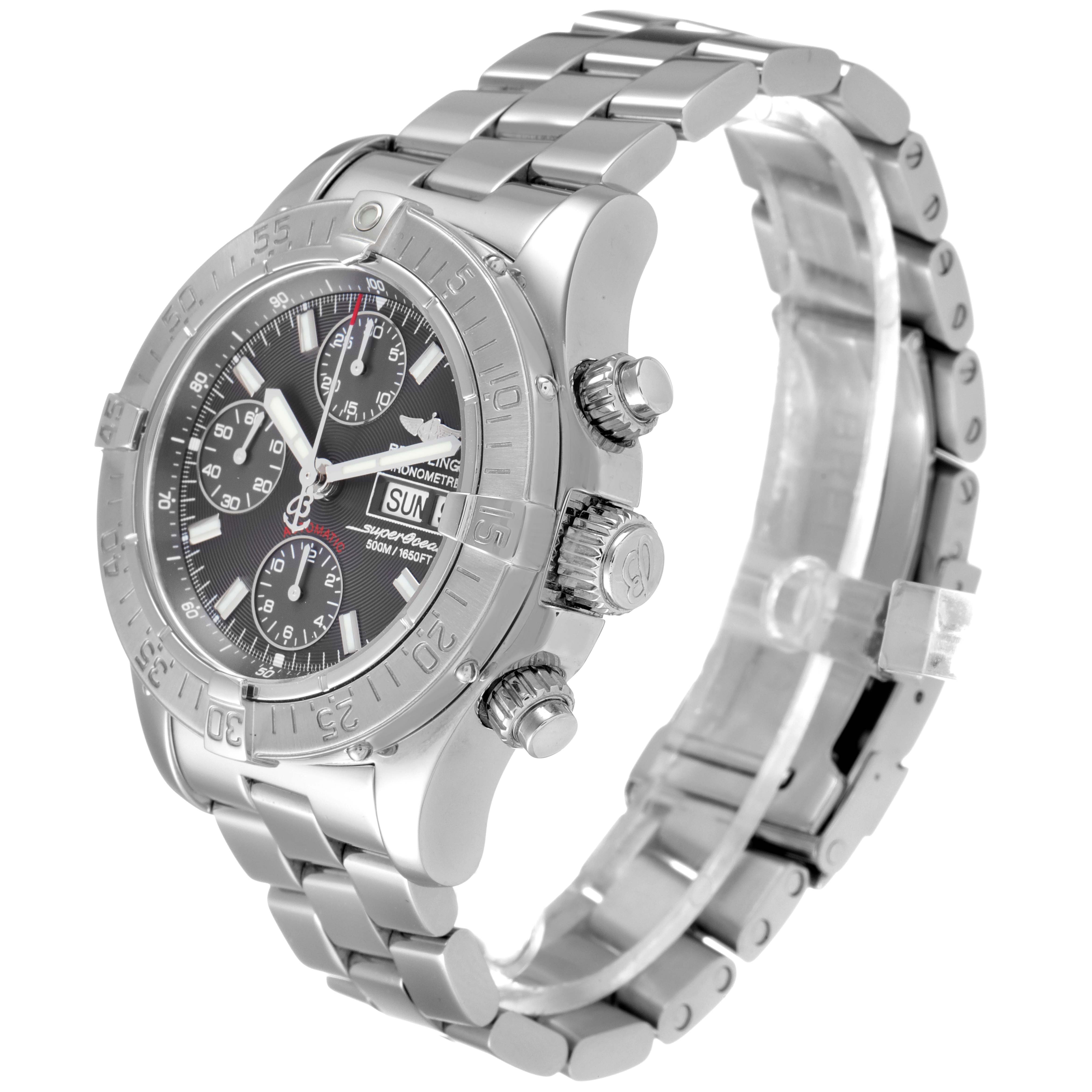 The image shows a side angle view of the Superocean model by Breitling, displaying its dial, bezel, crown, and stainless steel bracelet.