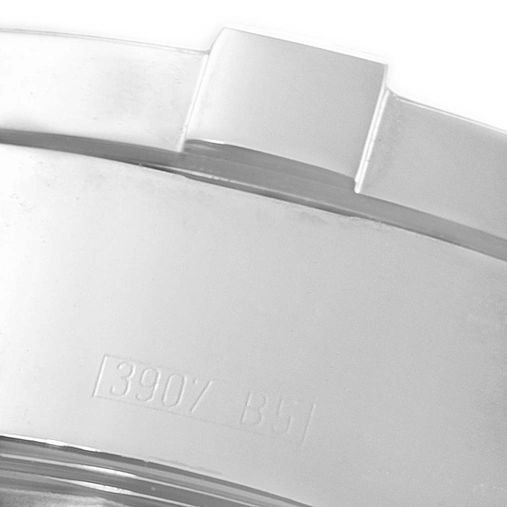 This close-up image of the Breitling Superocean A13340 Men's Stainless Steel Grey Dial A13340 Men's Stainless Steel Grey Dial watch shows part of its bezel and engraved serial number.