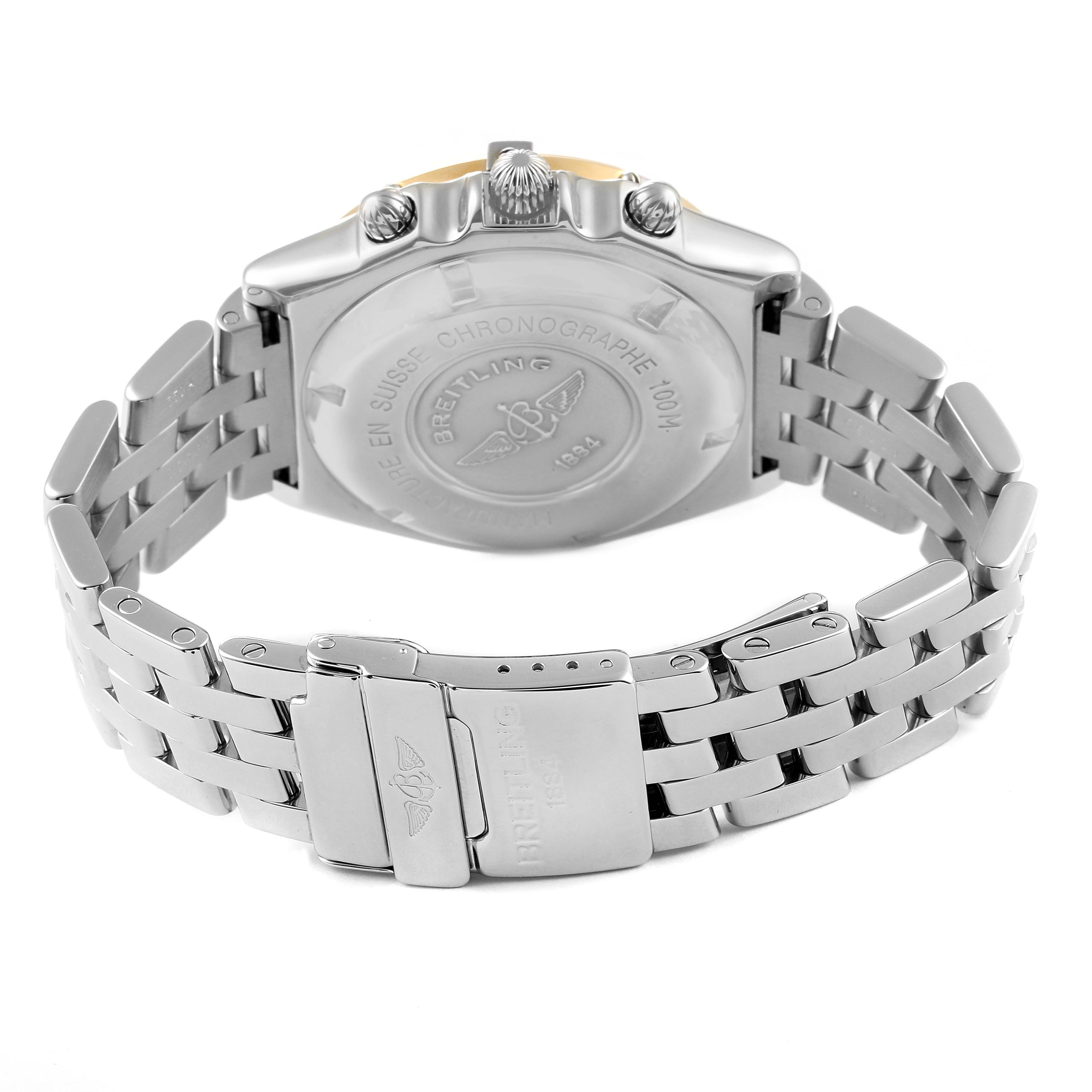 The image shows the back view and clasp of a Breitling Chronomat D13055 Men's Steel and Gold (two tone) White Dial D13055 Men's Steel and Gold (two tone) White Dial watch, highlighting its stainless steel case and bracelet.
