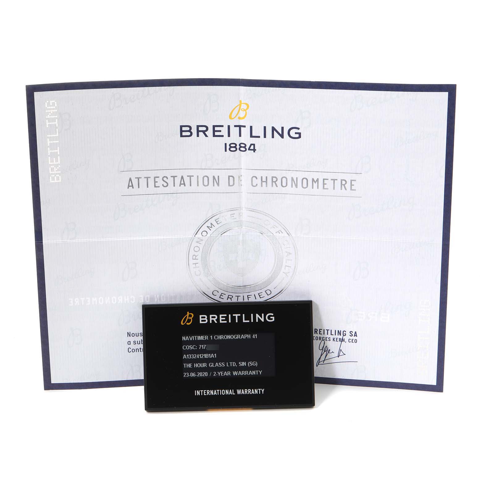 This image shows the Breitling Navitimer A13324 Men
s Stainless Steel Black Dial A13324 Men
s Stainless Steel Black Dial model
s chronometer certificate and international warranty card.