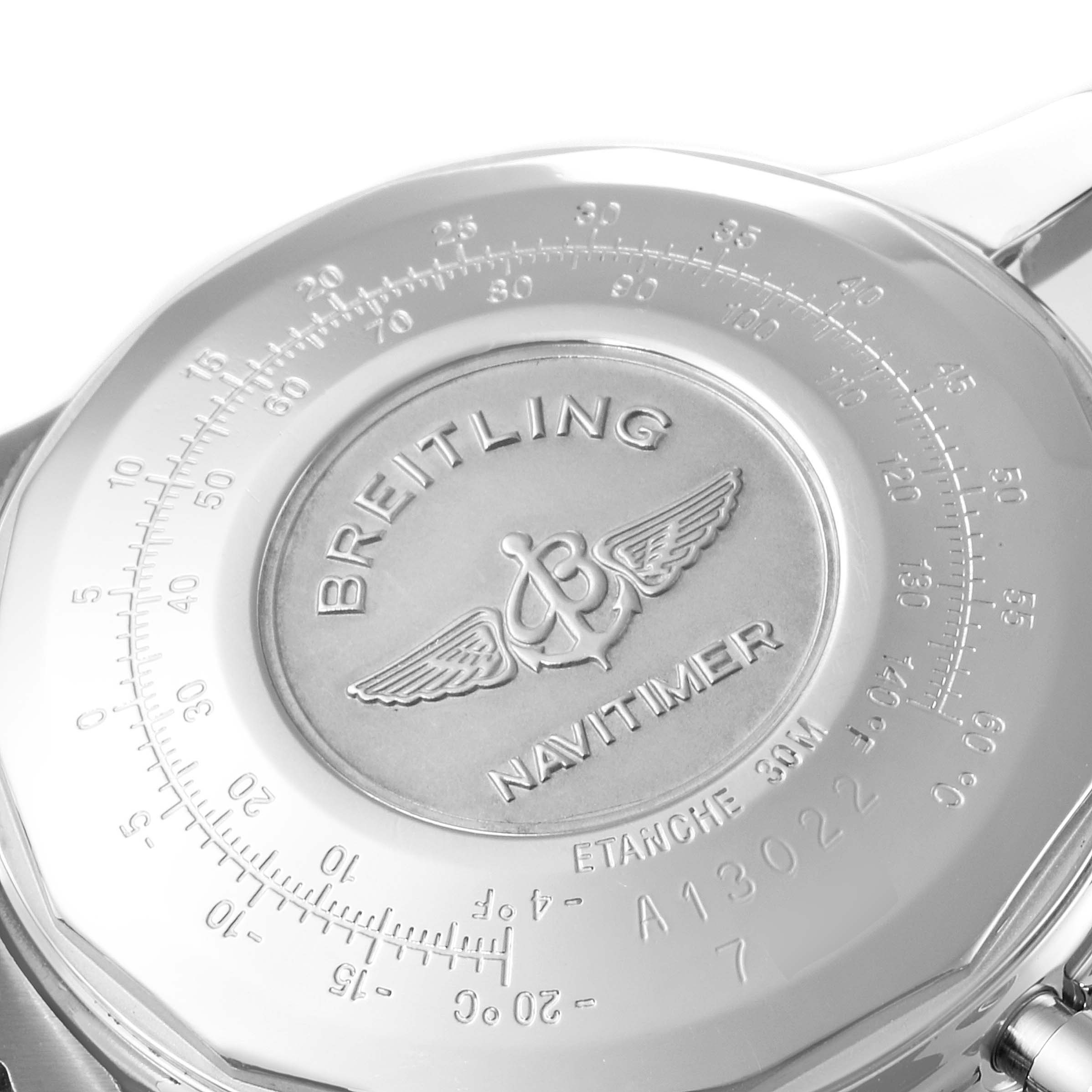 The image shows the back case of a Breitling Navitimer A13022 Men
s Stainless Steel Black Dial A13022 Men
s Stainless Steel Black Dial watch with engraved details and branding.