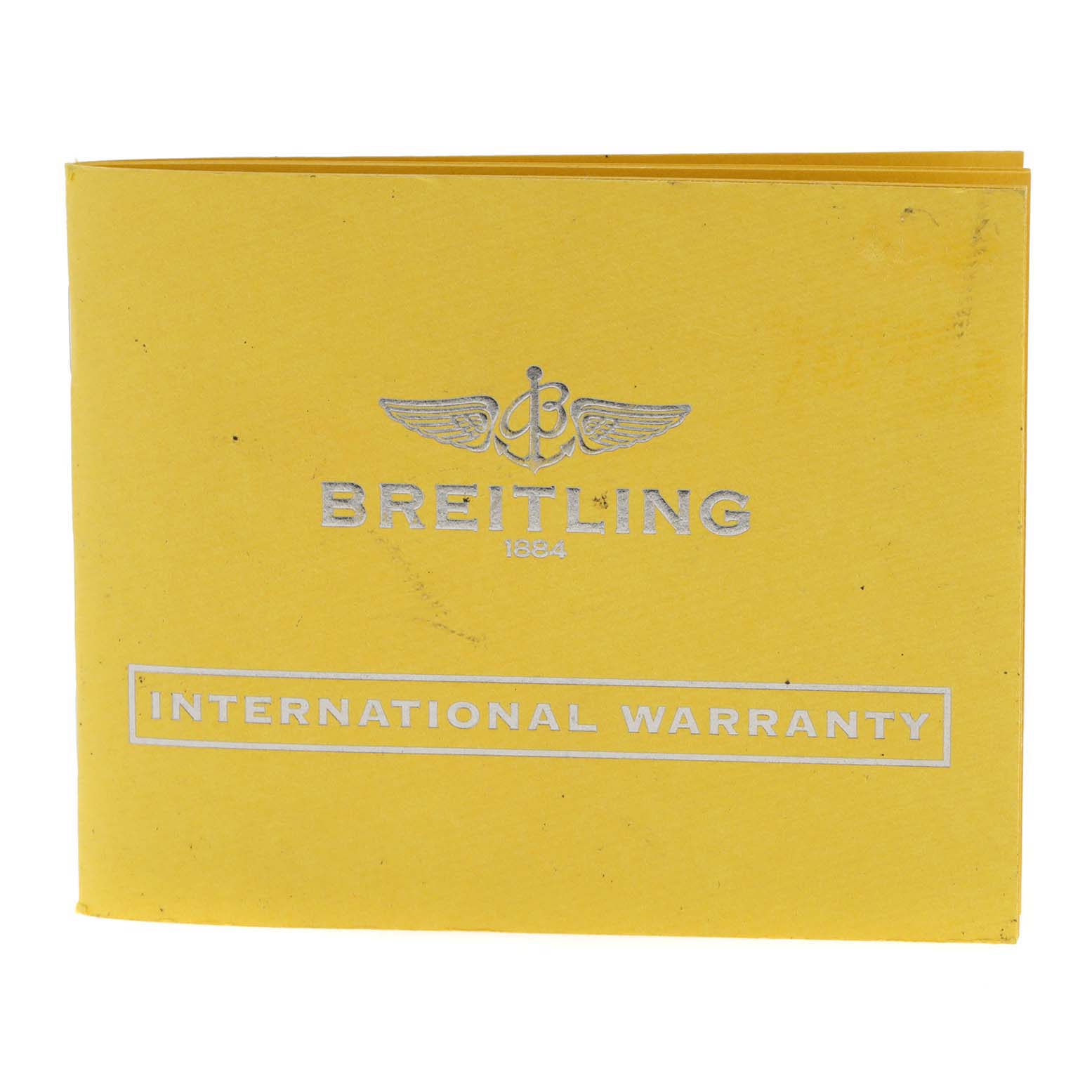 This is a front view of the Breitling Superocean A17364 Men
s Stainless Steel Black Dial A17364 Men
s Stainless Steel Black Dial
s yellow international warranty booklet.