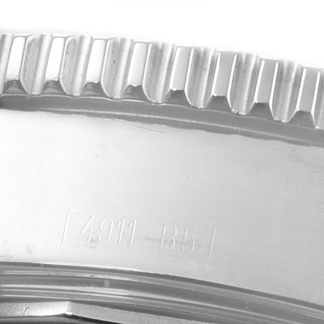 This close-up image of the Breitling Superocean A17364 Men
s Stainless Steel Black Dial A17364 Men
s Stainless Steel Black Dial watch shows the side view of the bezel with its engraved detailing.