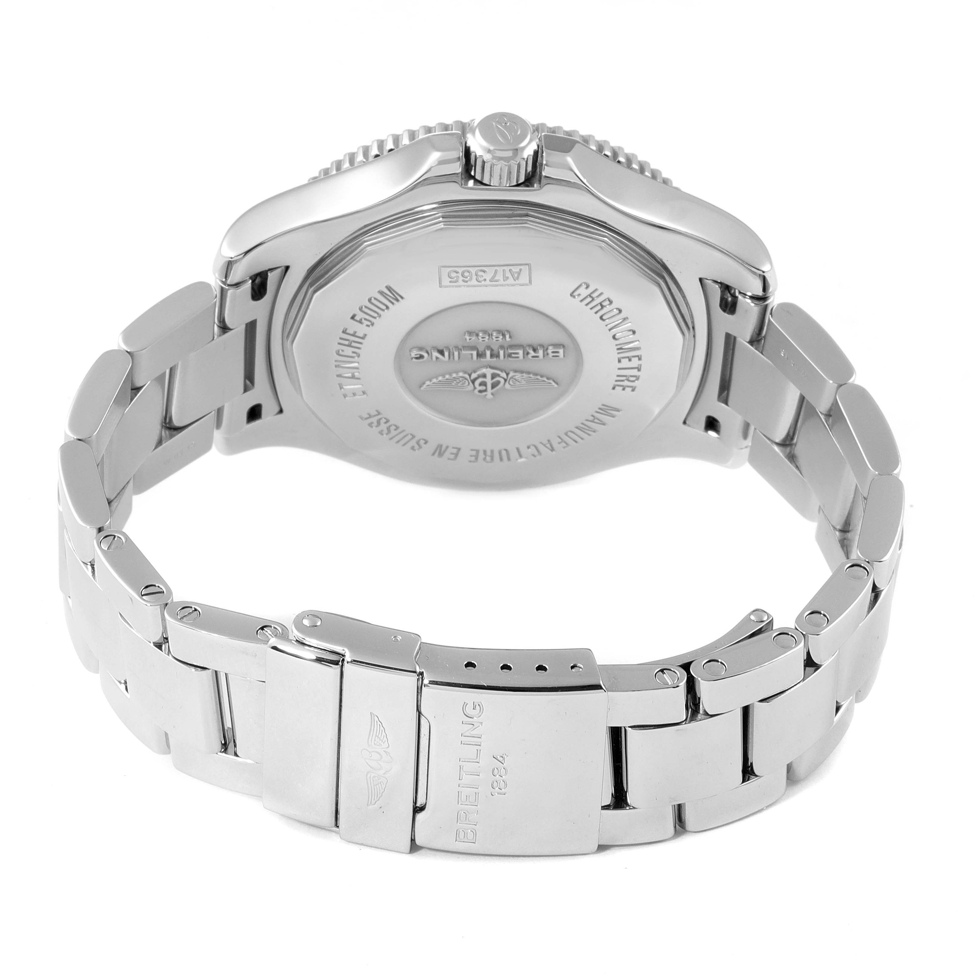 The image shows the back view of a Breitling Superocean A17365 Men
s Stainless Steel Black Dial A17365 Men
s Stainless Steel Black Dial watch, highlighting the case back and part of the stainless steel bracelet with clasp.