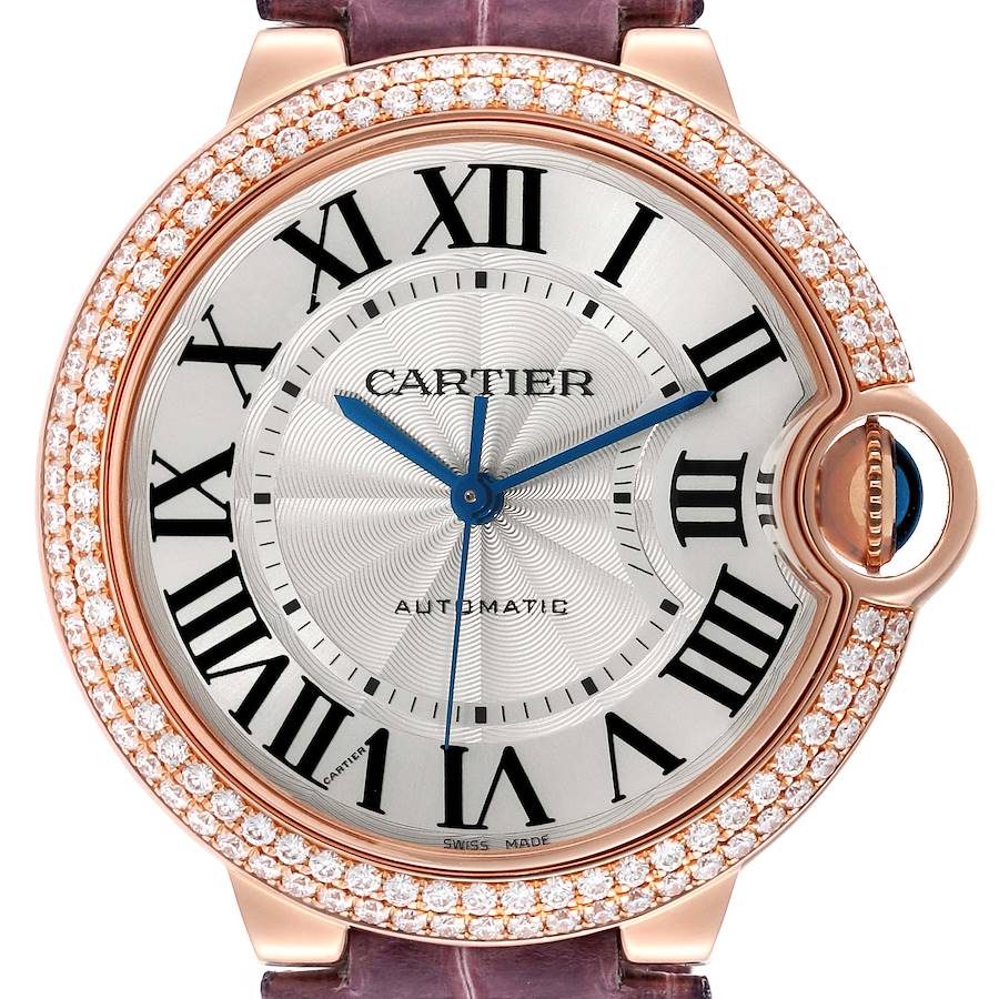 The image shows a close-up, front view of a Cartier Ballon Bleu watch face with diamond bezel, Roman numeral markers, and leather strap.