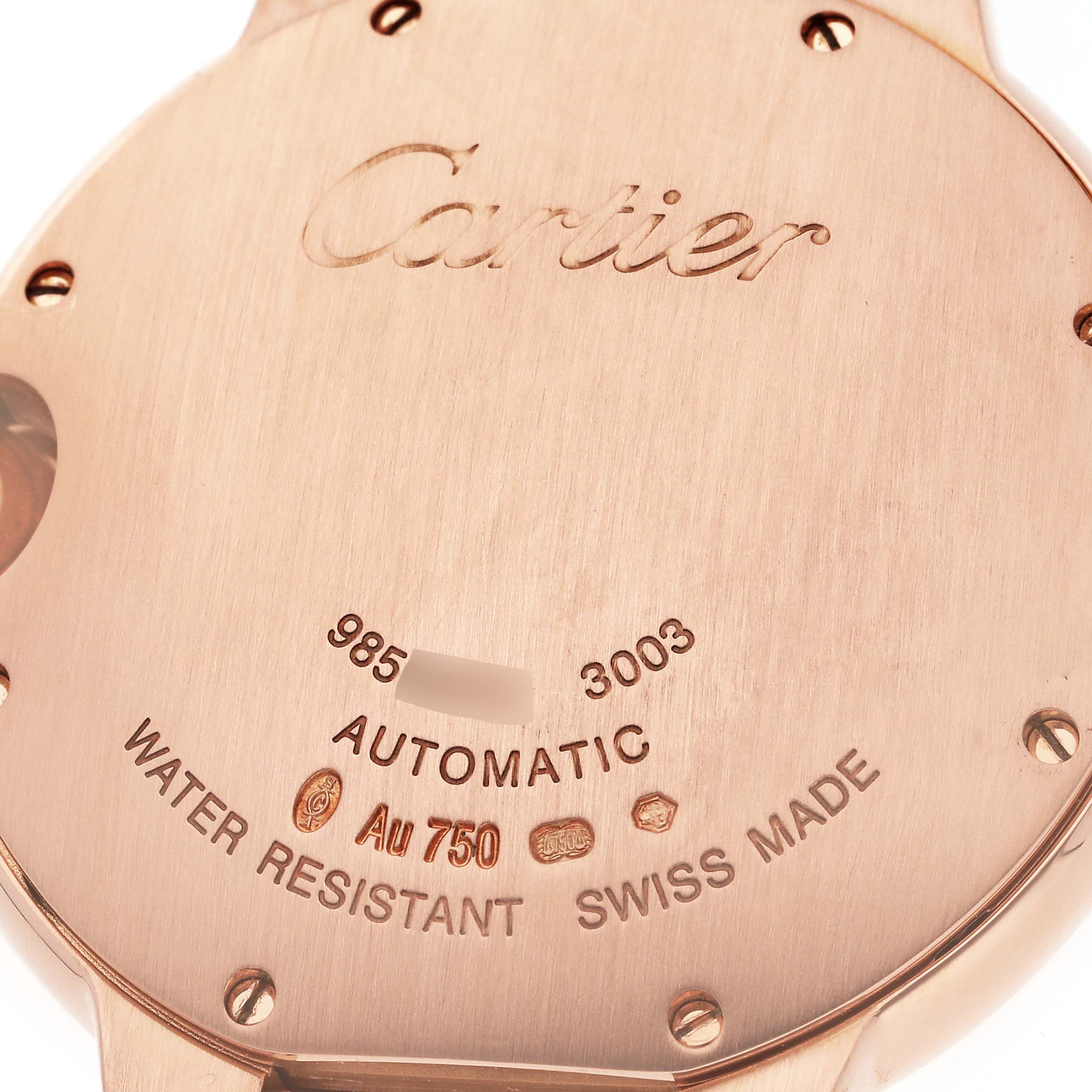 This image shows the engraved case back of the Cartier Ballon Bleu WE900551 Women's Rose Gold Silver Dial WE900551 Women's Rose Gold Silver Dial watch, highlighting its automatic movement and Swiss origin.
