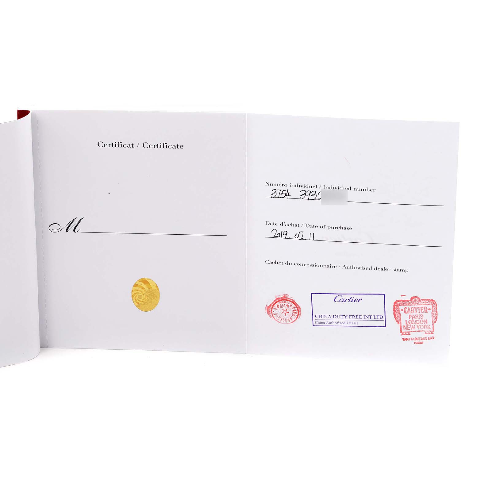 The image shows an open certificate for the Cartier Ballon Bleu W2BB0003 Men
s Steel and Gold (two tone) Silver Dial W2BB0003 Men
s Steel and Gold (two tone) Silver Dial, displaying purchase details and dealer stamps.