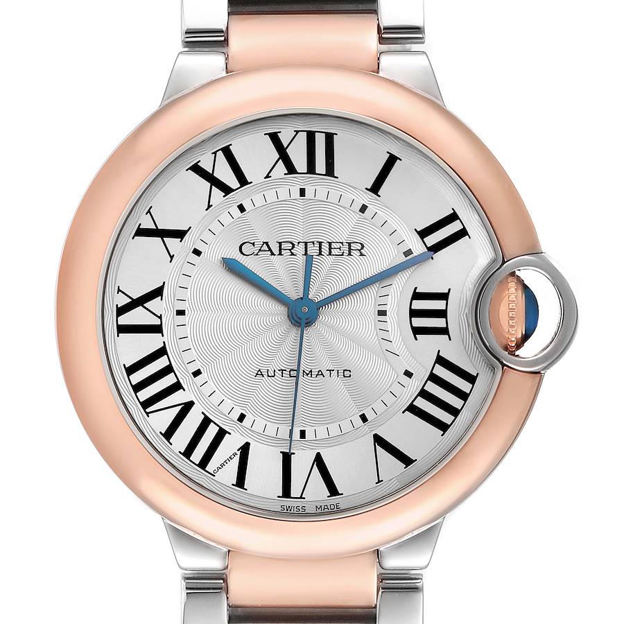 The image shows a Cartier Ballon Bleu watch front view, highlighting the face, Roman numerals, and the crown with its distinctive blue cabochon.