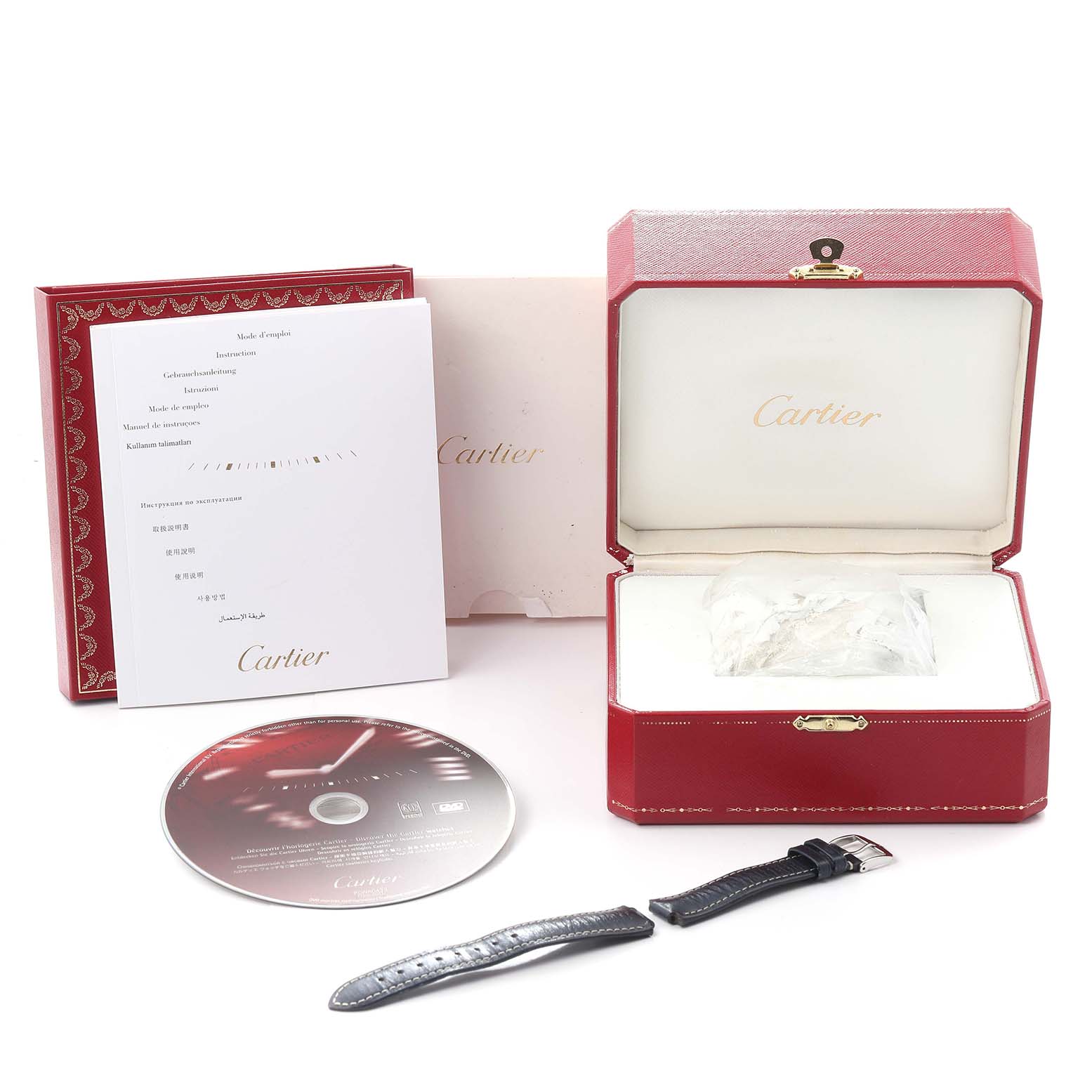 The Ballon Bleu by Cartier is shown with its open box, extra leather strap, booklet, and CD, all from a front-view angle.