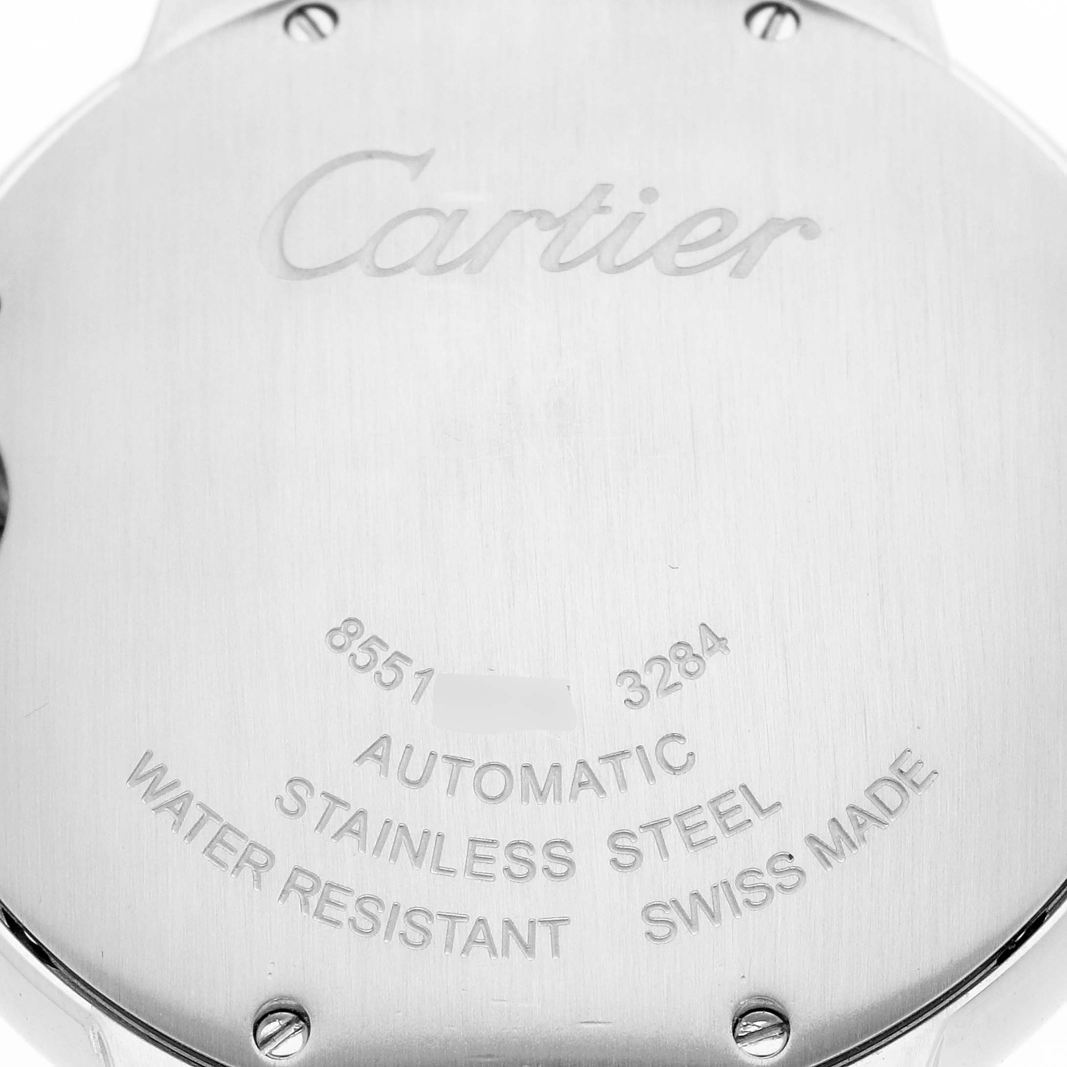 The image shows the back case of a Cartier Ballon Bleu W69017Z4 Men
s Stainless Steel Silver Dial W69017Z4 Men
s Stainless Steel Silver Dial watch, highlighting engravings about its materials and features.