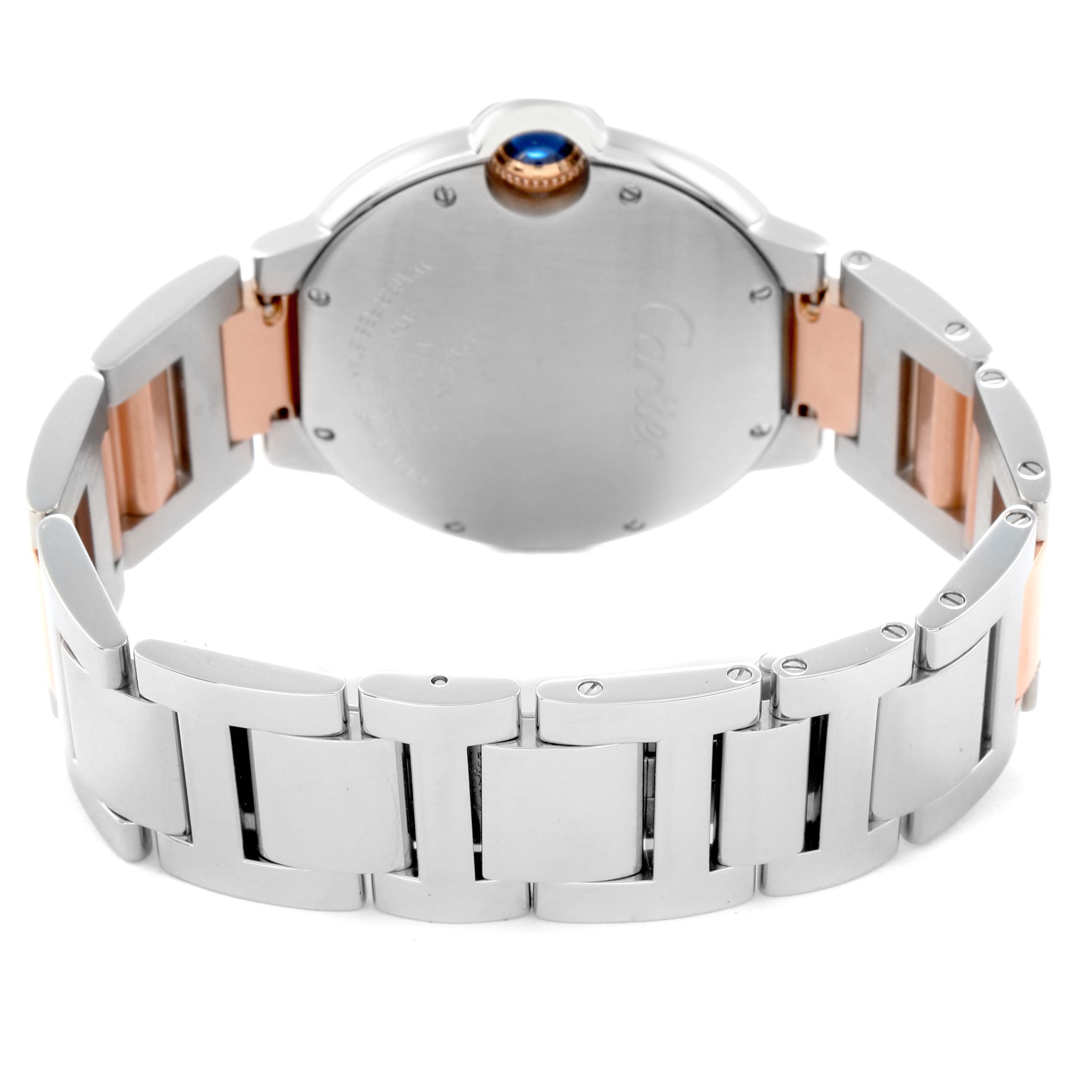 The image shows the back and bracelet of the Cartier Ballon Bleu W6920033 Women
s Steel and Gold (two tone) Mother of Pearl Dial W6920033 Women
s Steel and Gold (two tone) Mother of Pearl Dial watch, highlighting the clasp and case back.