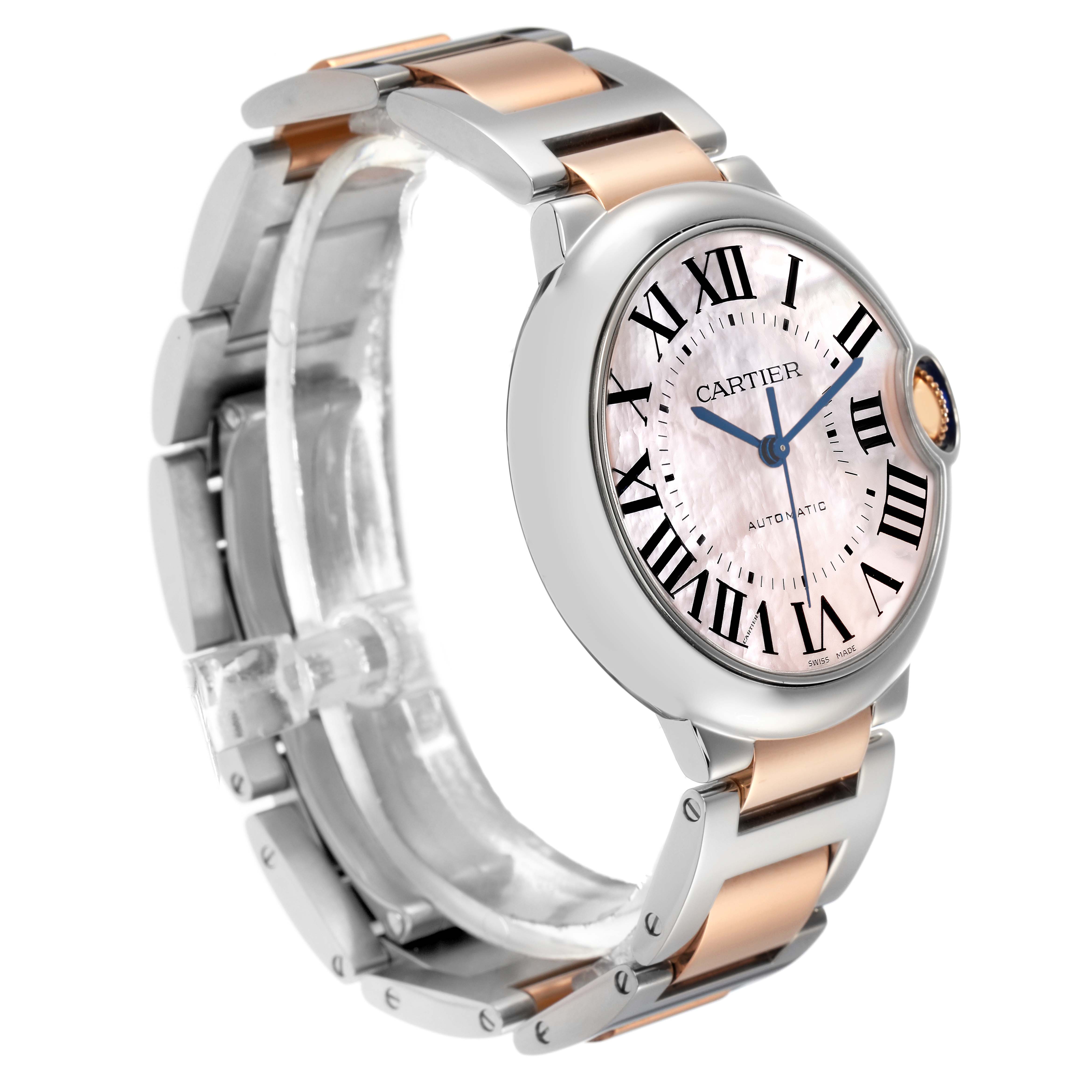 The Cartier Ballon Bleu W6920033 Women
s Steel and Gold (two tone) Mother of Pearl Dial W6920033 Women
s Steel and Gold (two tone) Mother of Pearl Dial watch is shown from a side angle, highlighting its face, case, and part of the bracelet.