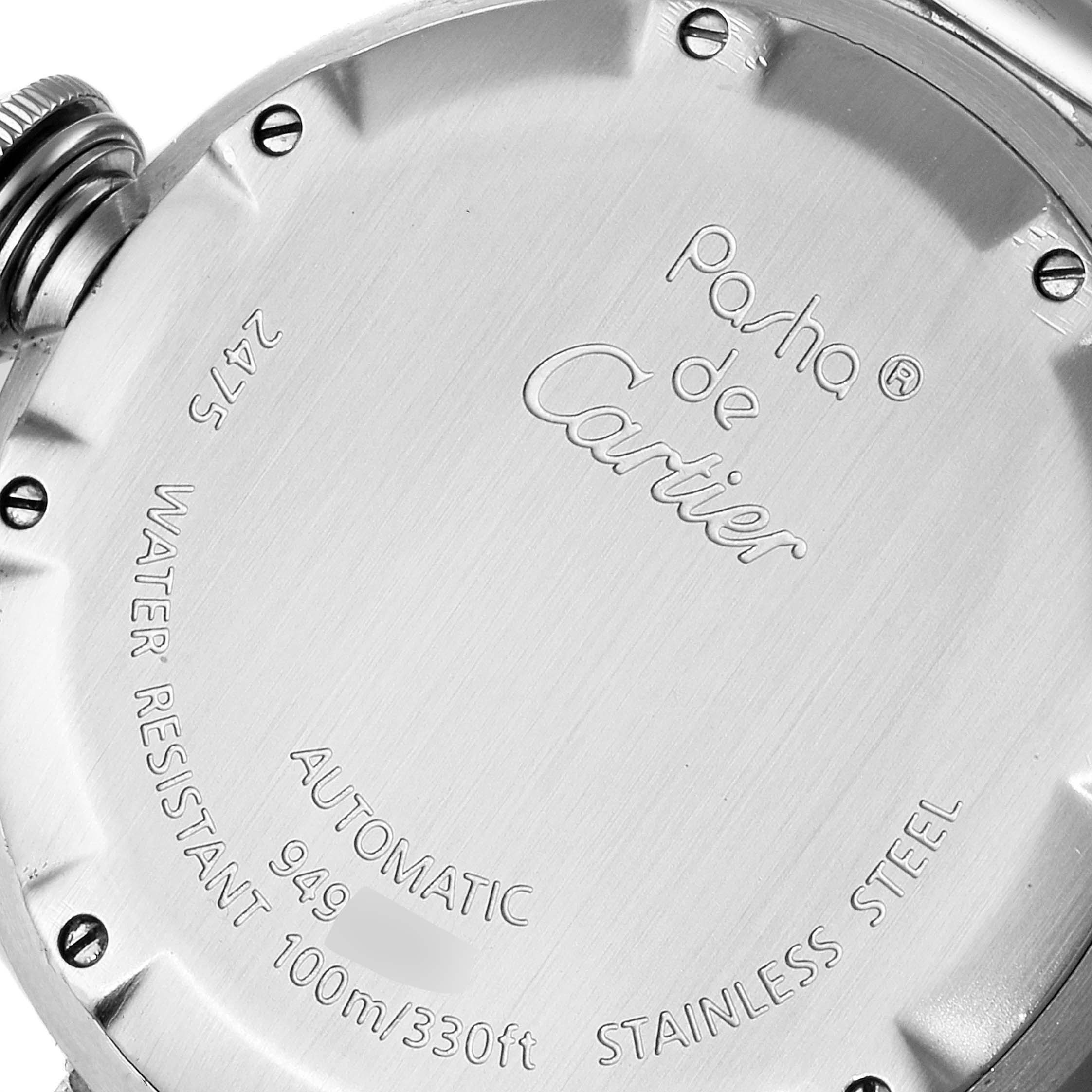 The image shows the back case of a Cartier Pasha W31044M7 Men's Stainless Steel White Dial W31044M7 Men's Stainless Steel White Dial watch with engraved details and screw accents.